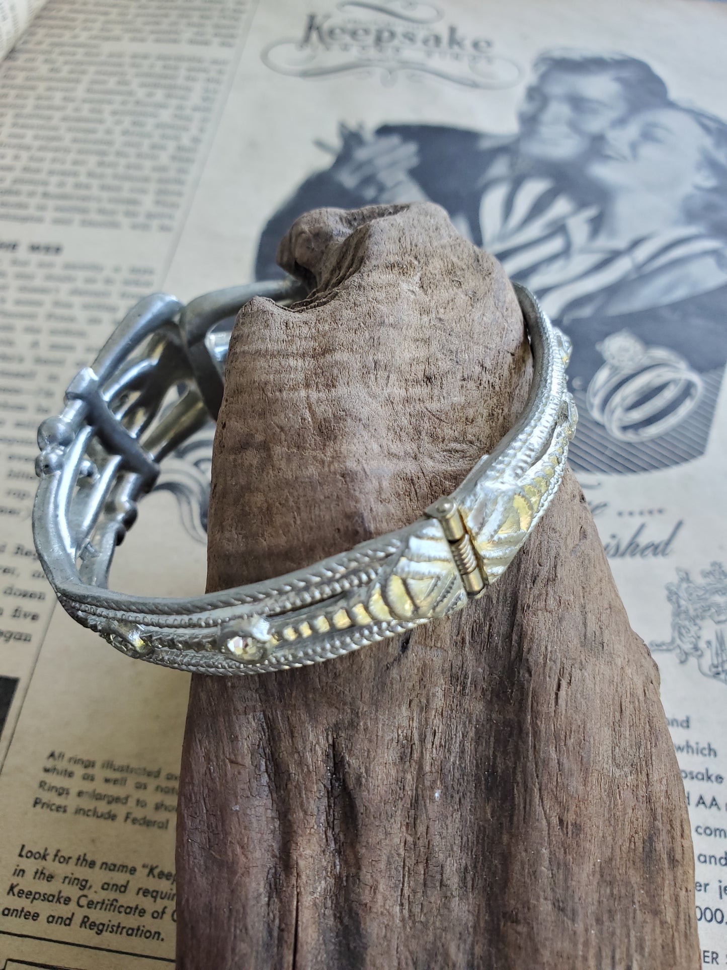 Art Deco pot metal pave set paste rhinestone clamper bracelet with Princess cut accents