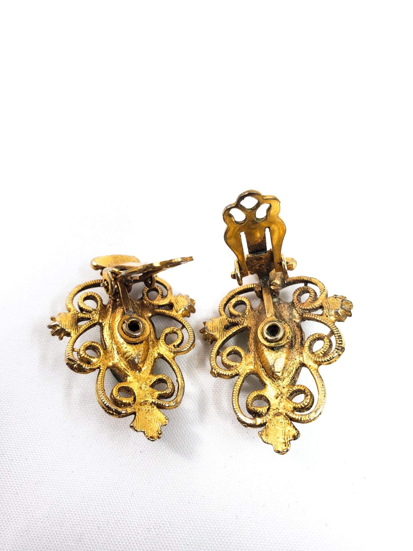 Vintage gold Christmas tree clip on earrings with molded green aurora borealis rhinestone