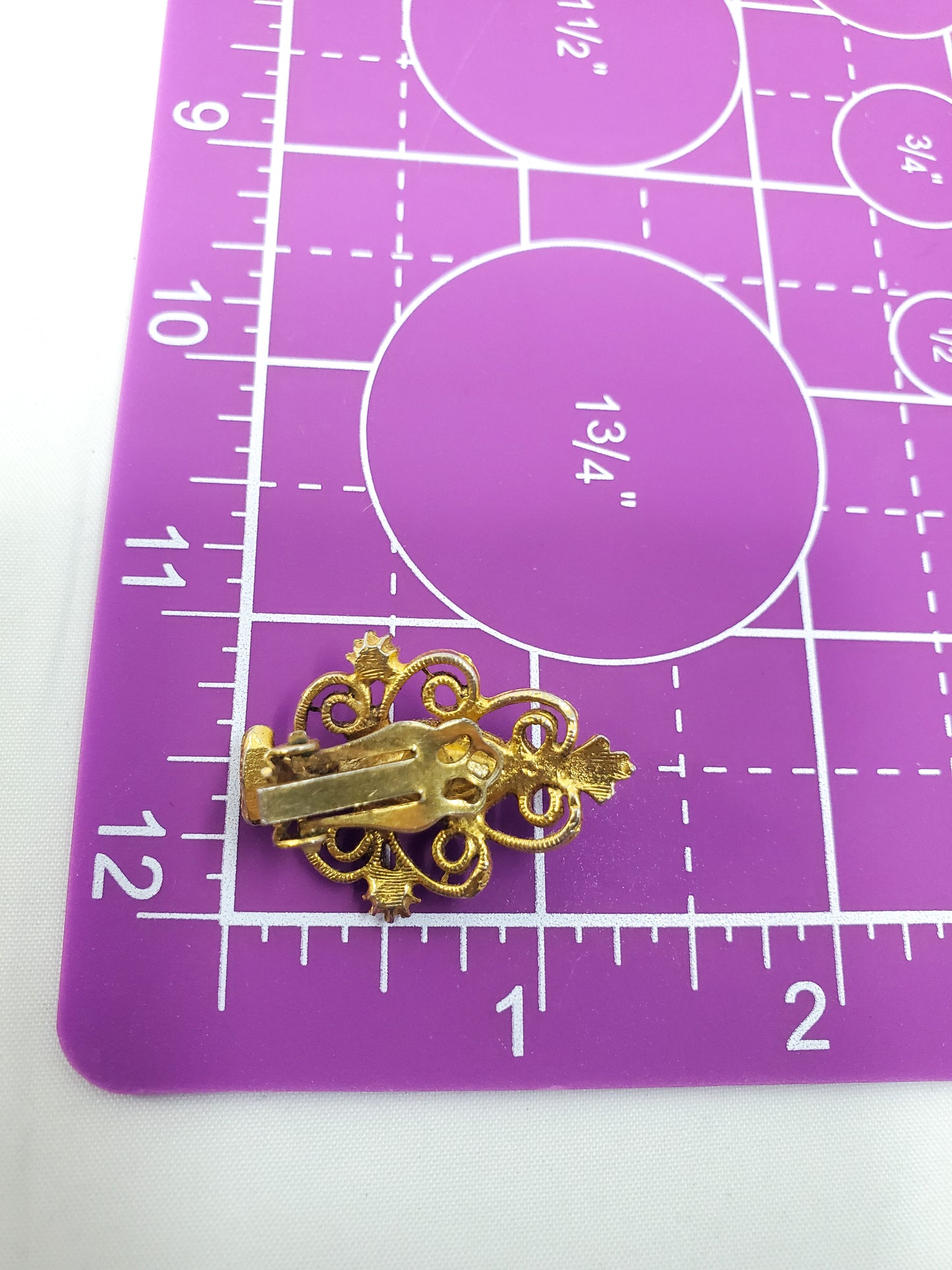 Vintage gold Christmas tree clip on earrings with molded green aurora borealis rhinestone