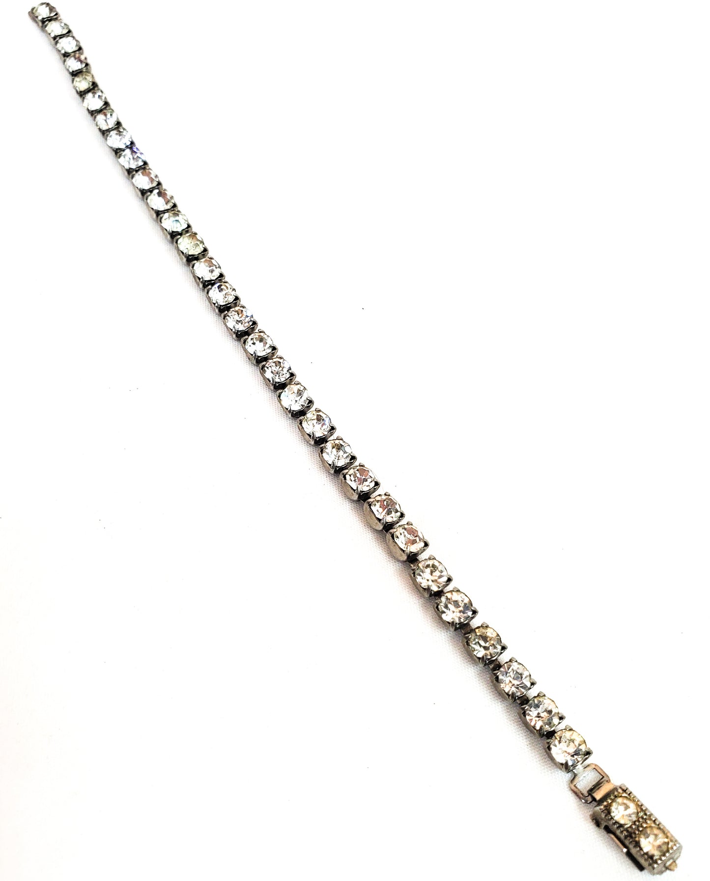 Mid century clear rhinestone tennis bracelet bright single strand pin up 1950's