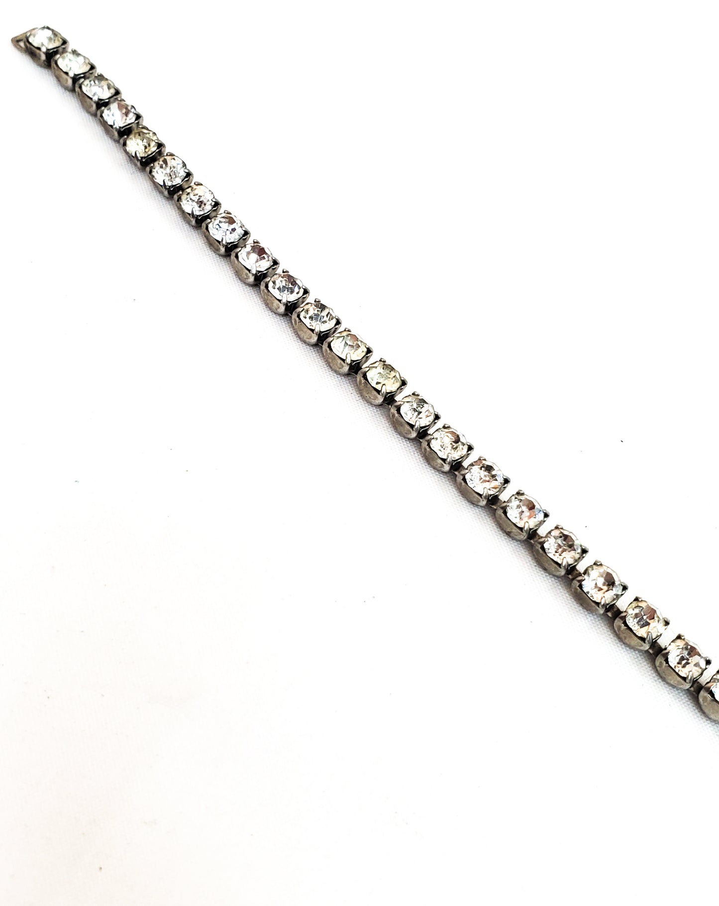 Mid century clear rhinestone tennis bracelet bright single strand pin up 1950's