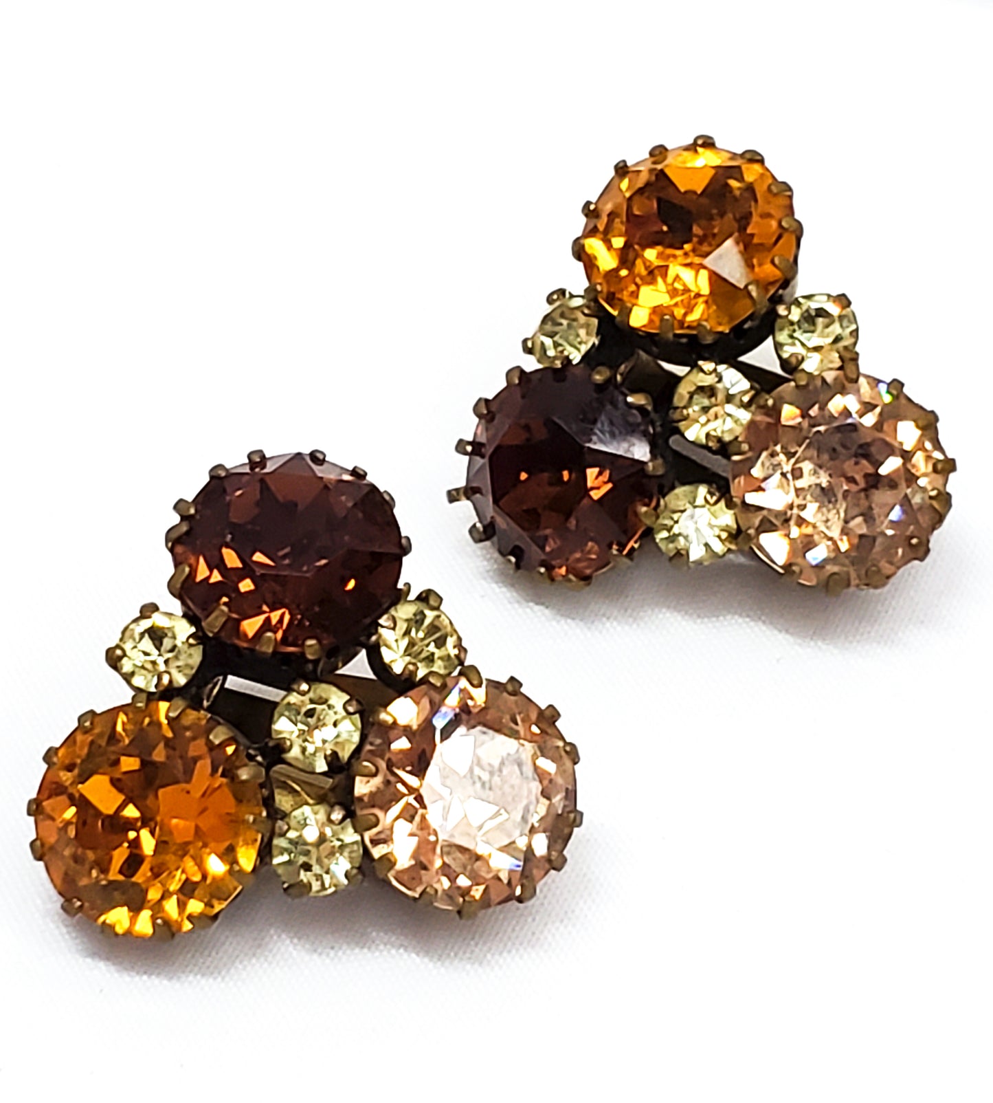 Austria Warm Amber toned rhinestone clip on vintage cluster earrings mid century