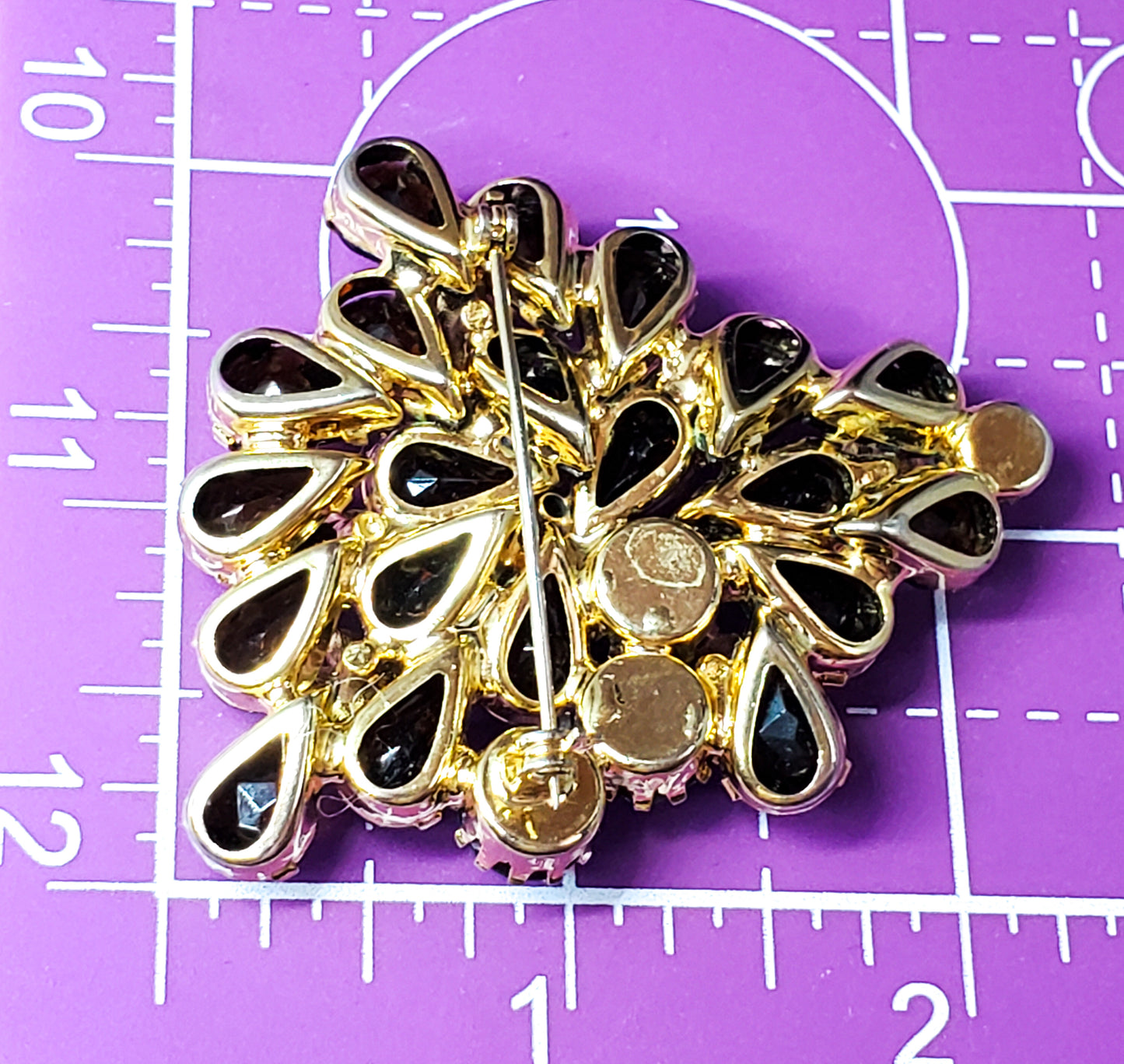 Topaz pear cut and gold toned flower rhinestone brooch unsigned beauty mid century