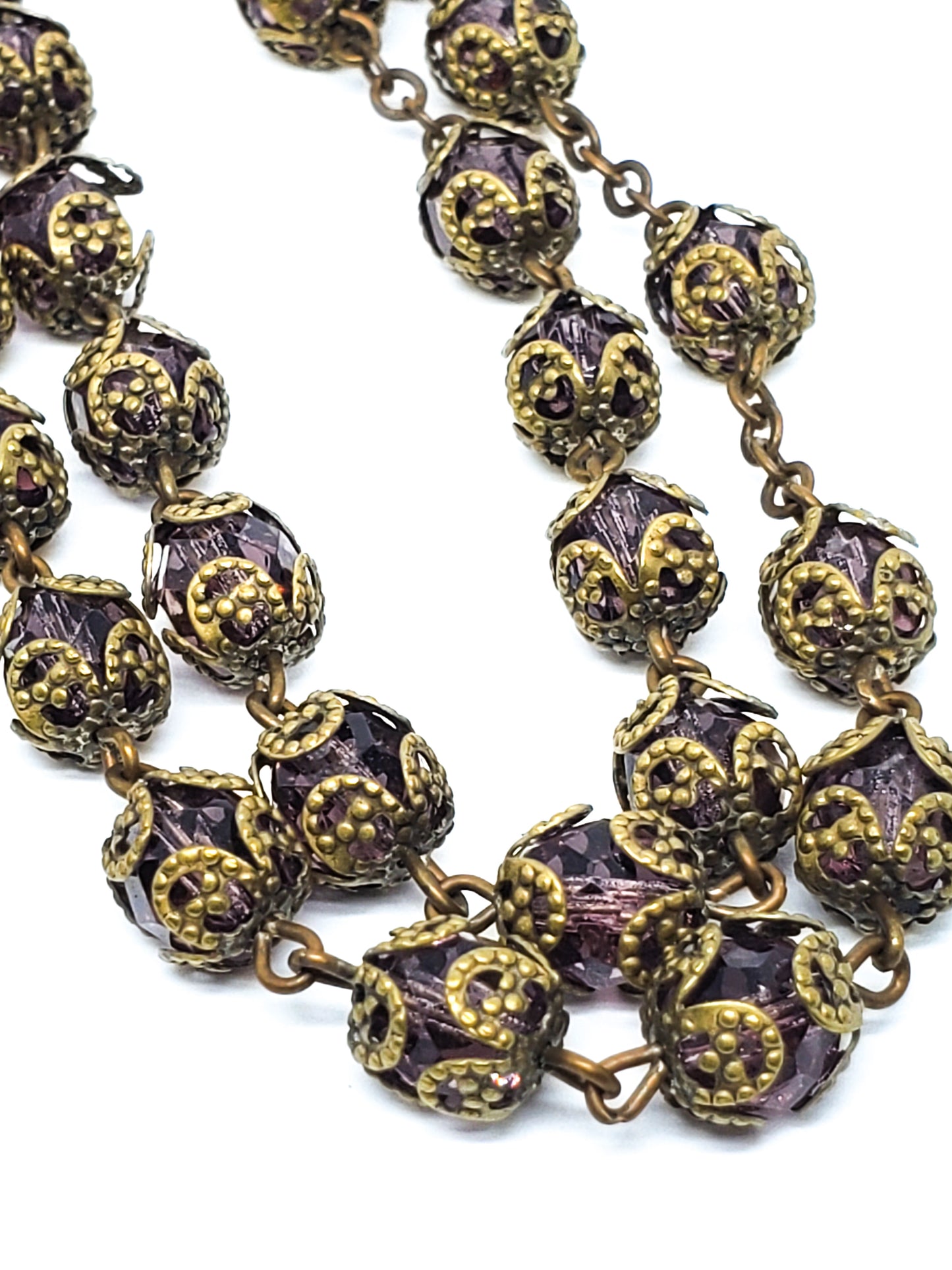 Long Venetian purple faceted glass vintage beaded necklace with brass flower caps