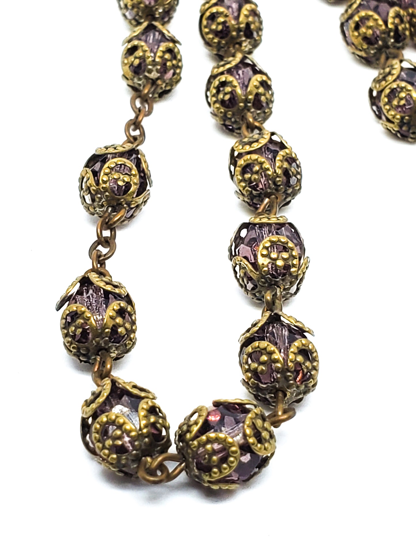 Long Venetian purple faceted glass vintage beaded necklace with brass flower caps