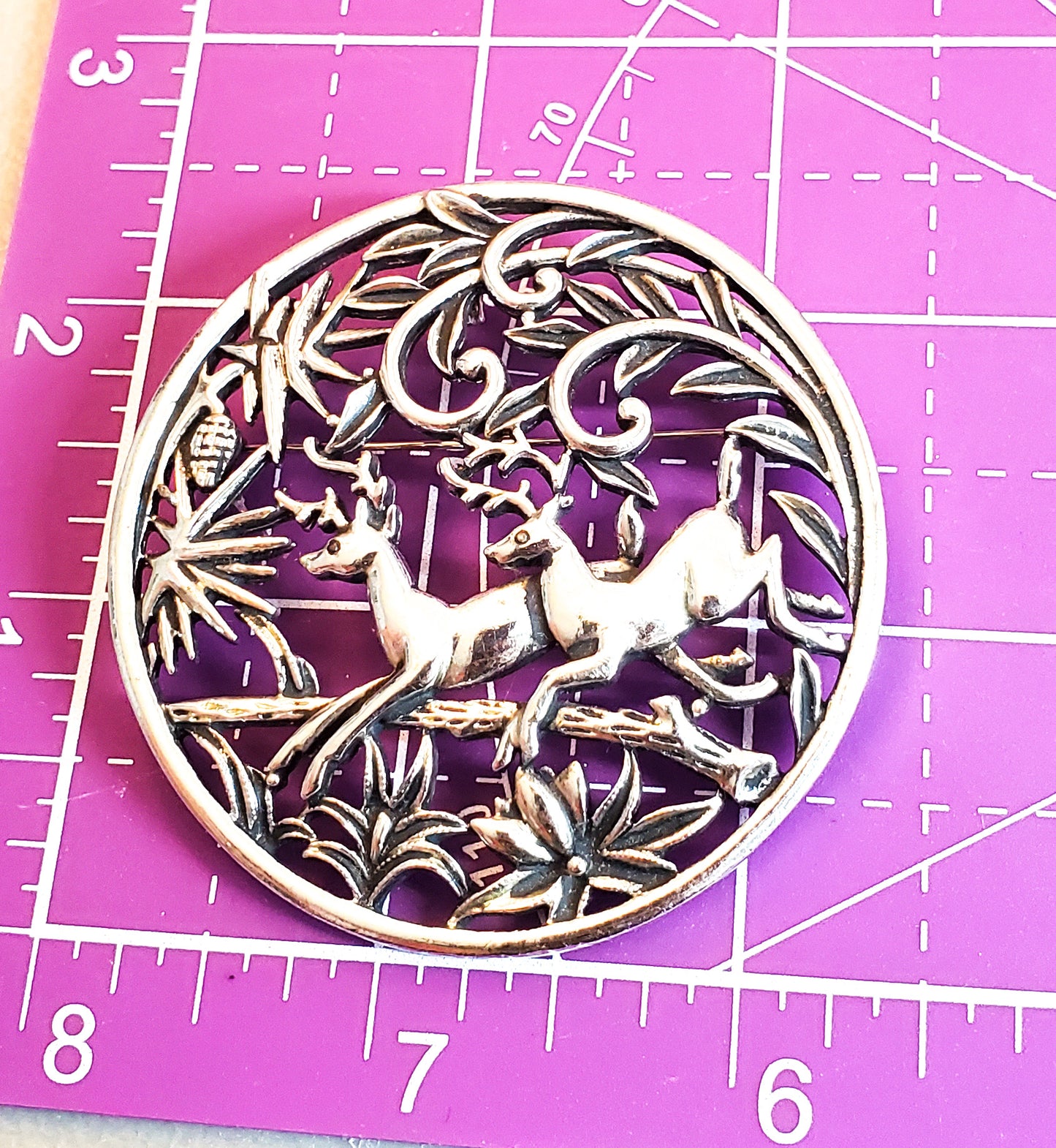 Sarah Coventry signed Christmas reindeer figural silver toned vintage brooch