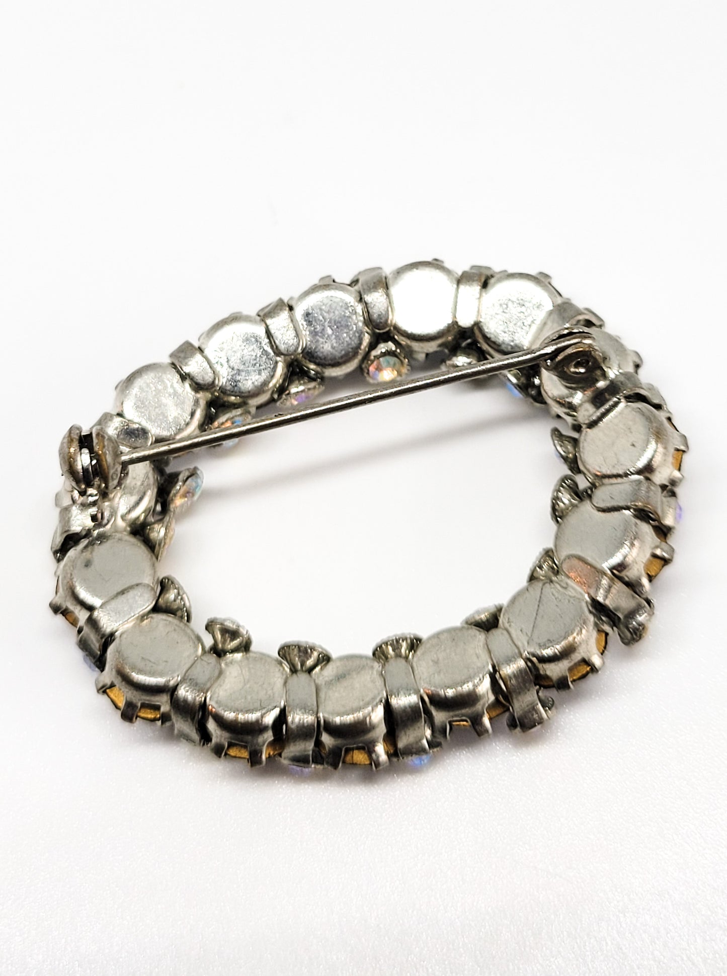 Black rainbow aurora borealis infinity vintage circle brooch pin