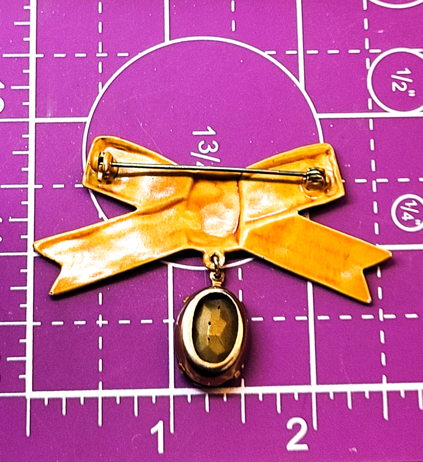 Mid century yellow enamel bow and topaz paste rhinestone vintage brooch