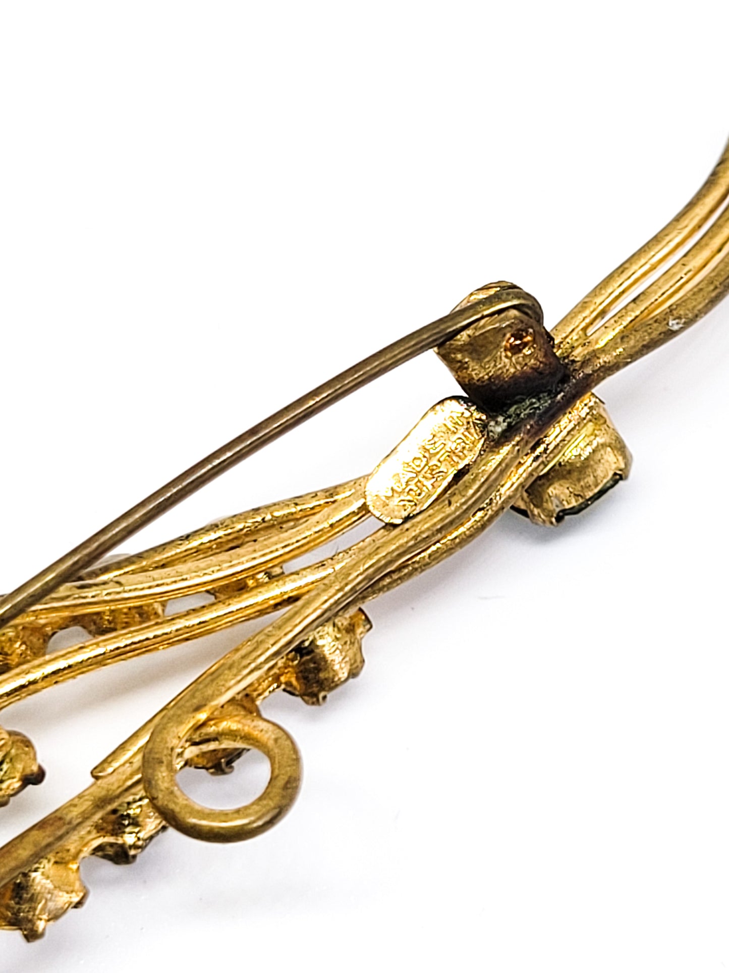 Made in Austrian bright green and clear chaton gold toned vintage mid century brooch