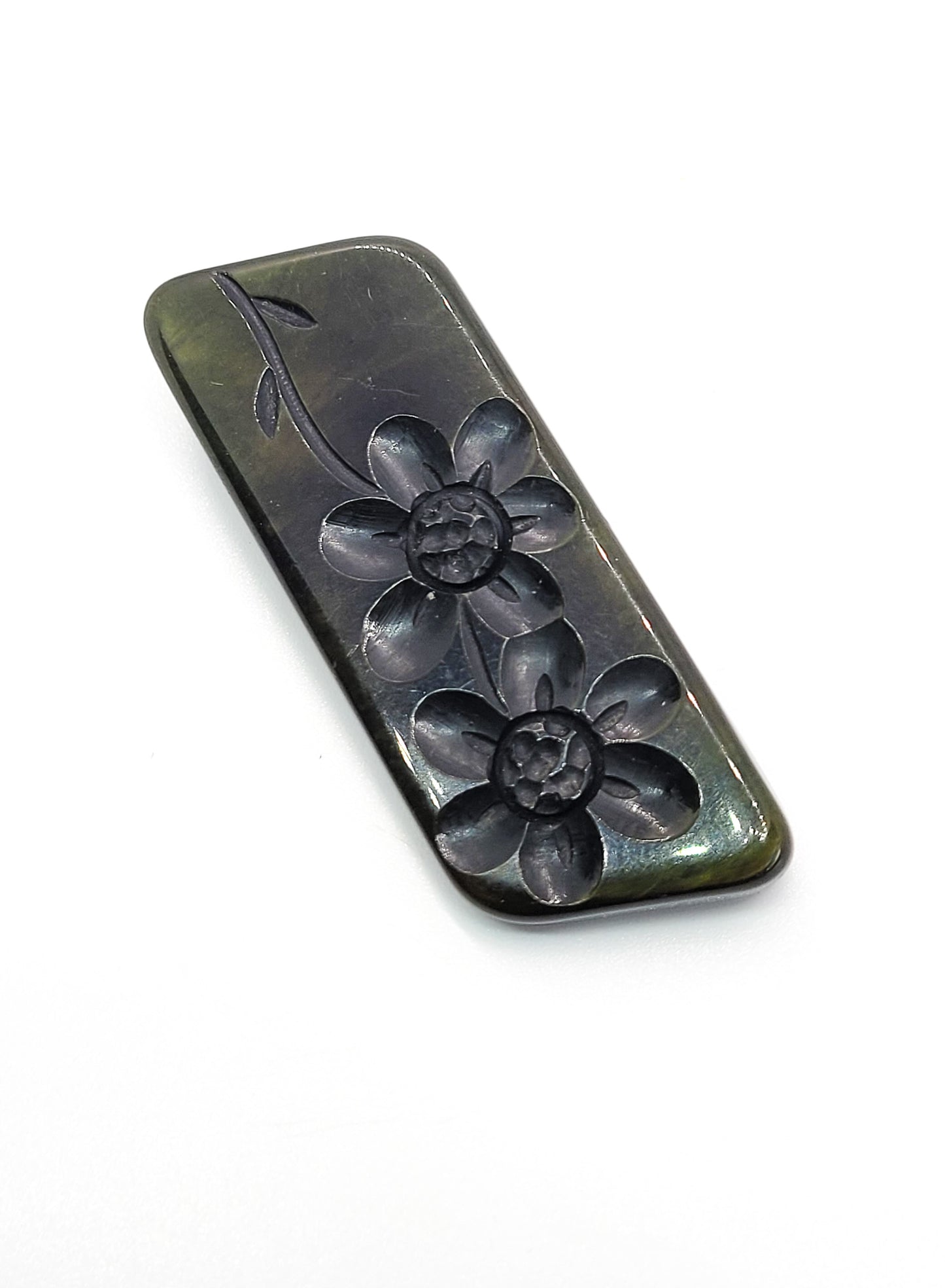 Deep carved flower marbled green two tone Bakelite made in Italy vintage brooch