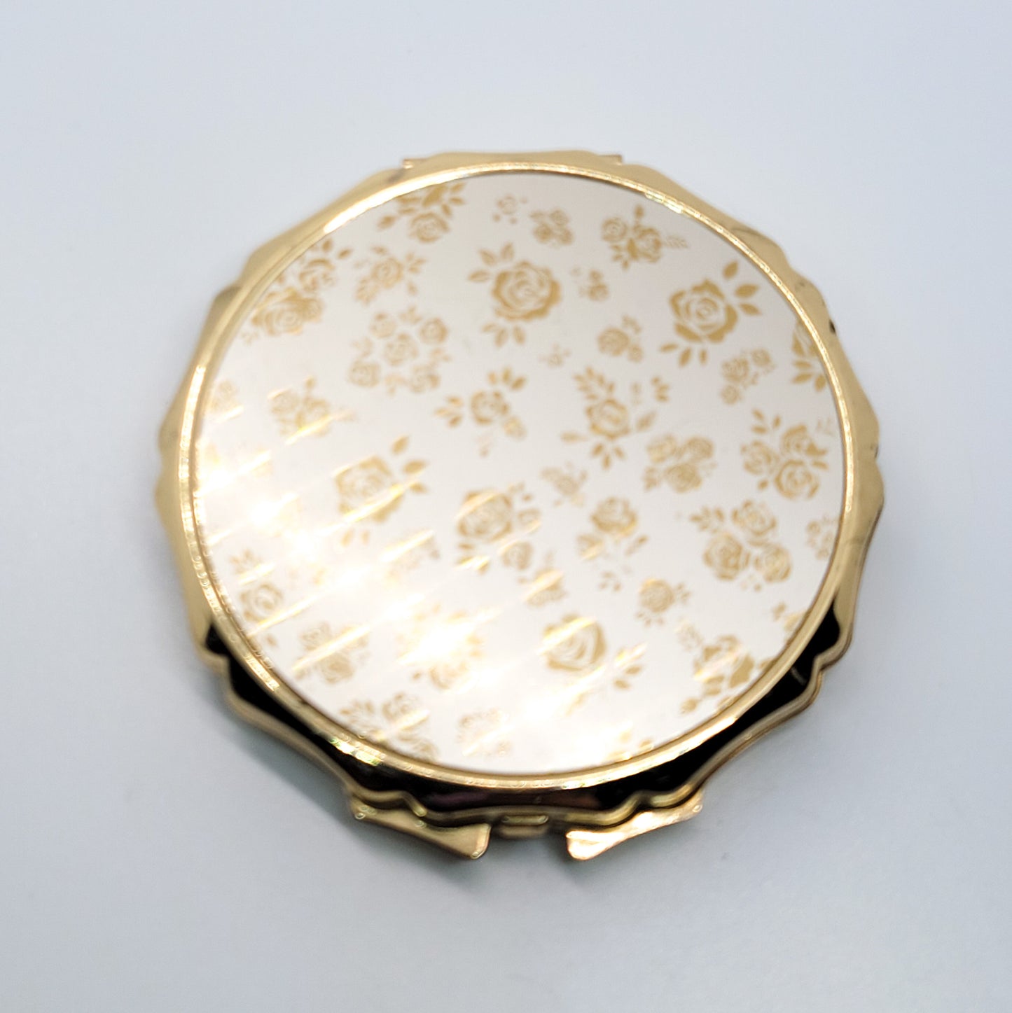 Dancing roses gold toned champagne Made in Japan vintage powder compact mirror