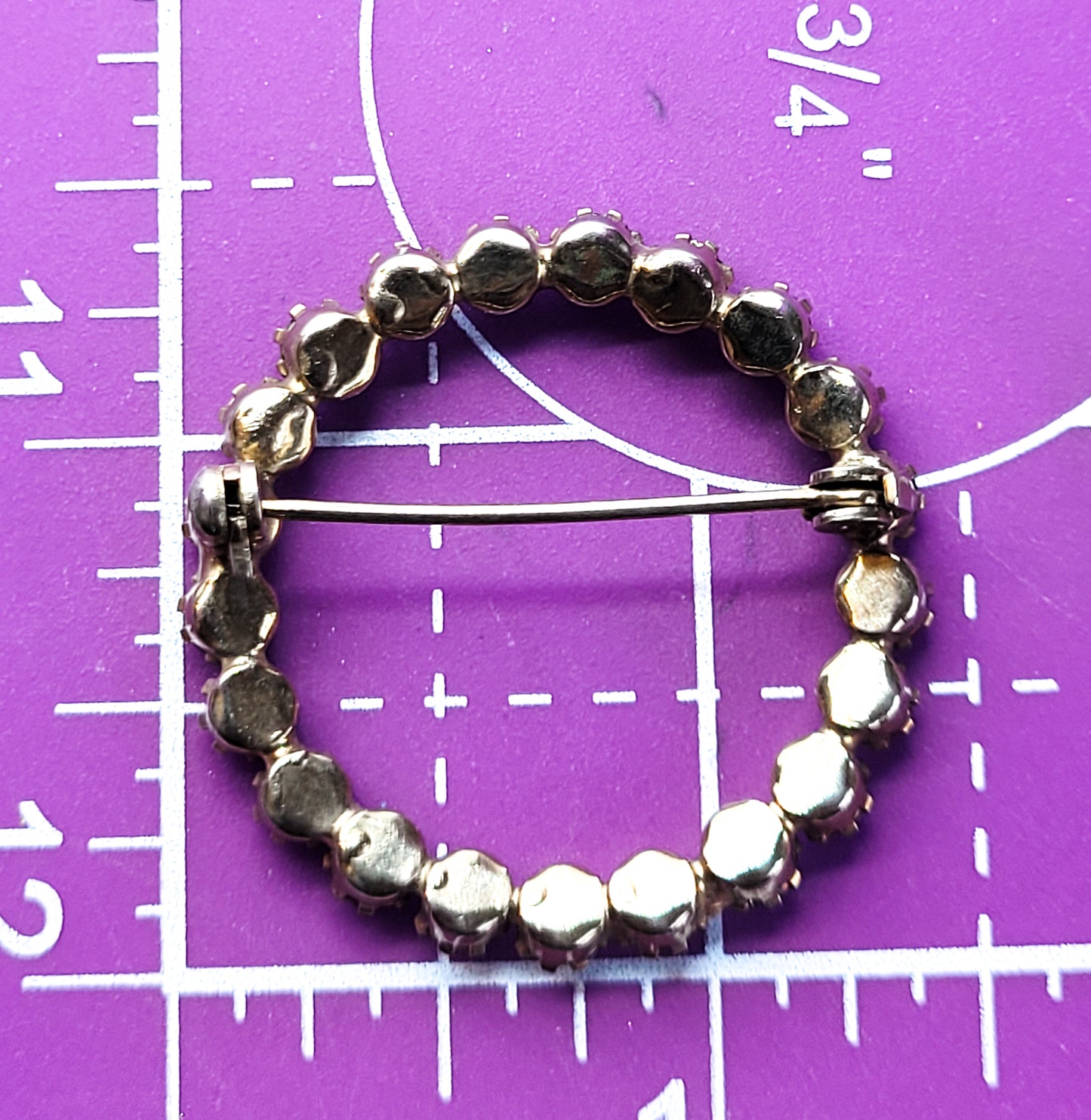 Topaz round orange rhinestone circle vintage infinity brooch mid century