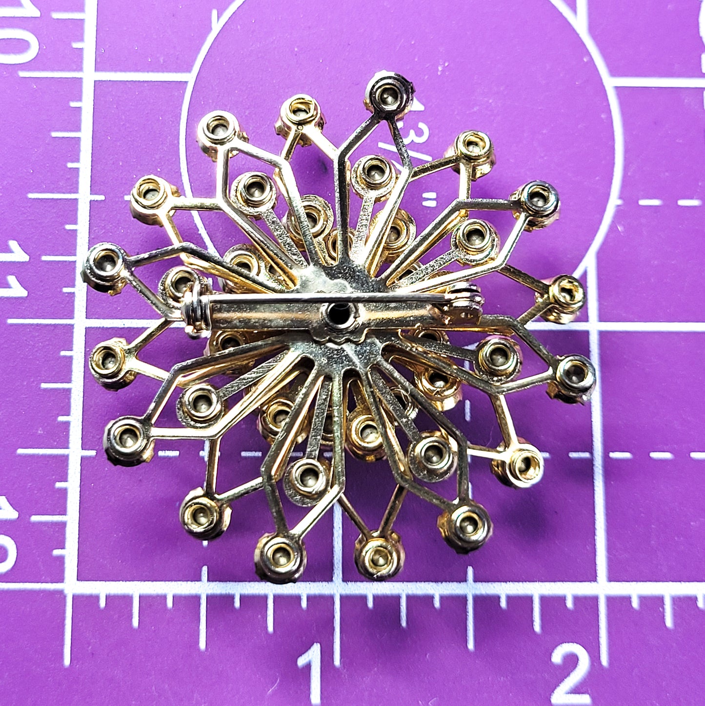 Rainbow aurora borealis AB gold tone MCM vintage atomic rhinestone brooch