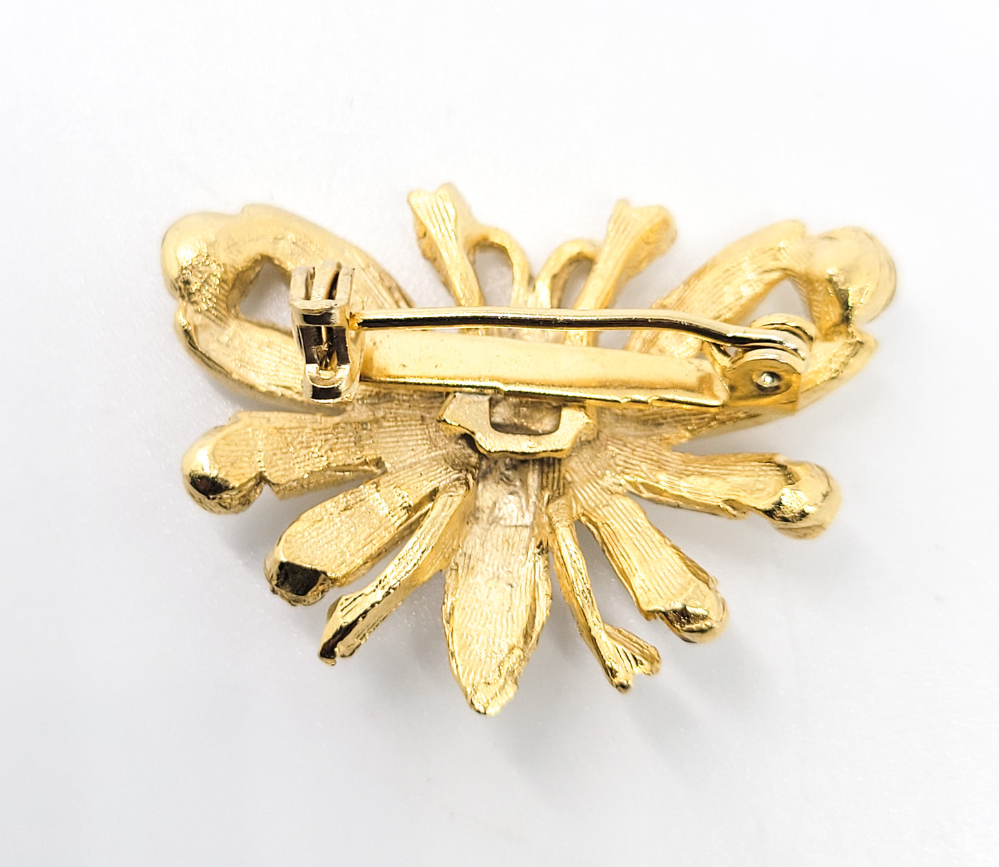 Bee gold toned vintage black and white rhinestone insect figural brooch