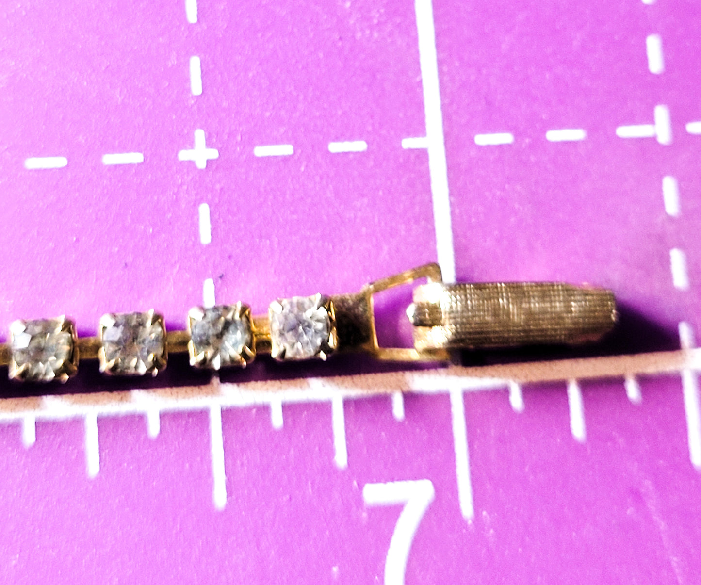 Single row simple clear gold toned vintage rhinestone tennis bracelet