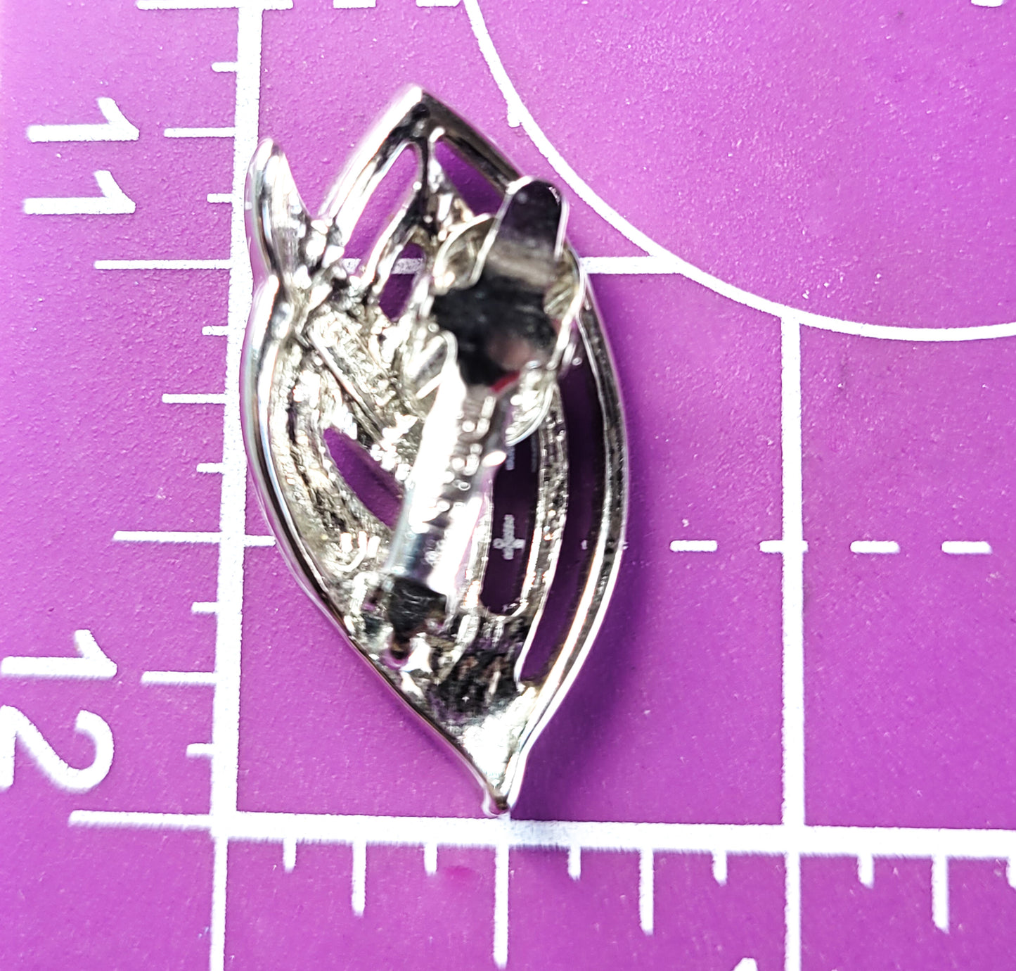 Trifari TM Modernist silver toned retro clip on earrings with adjustable clip