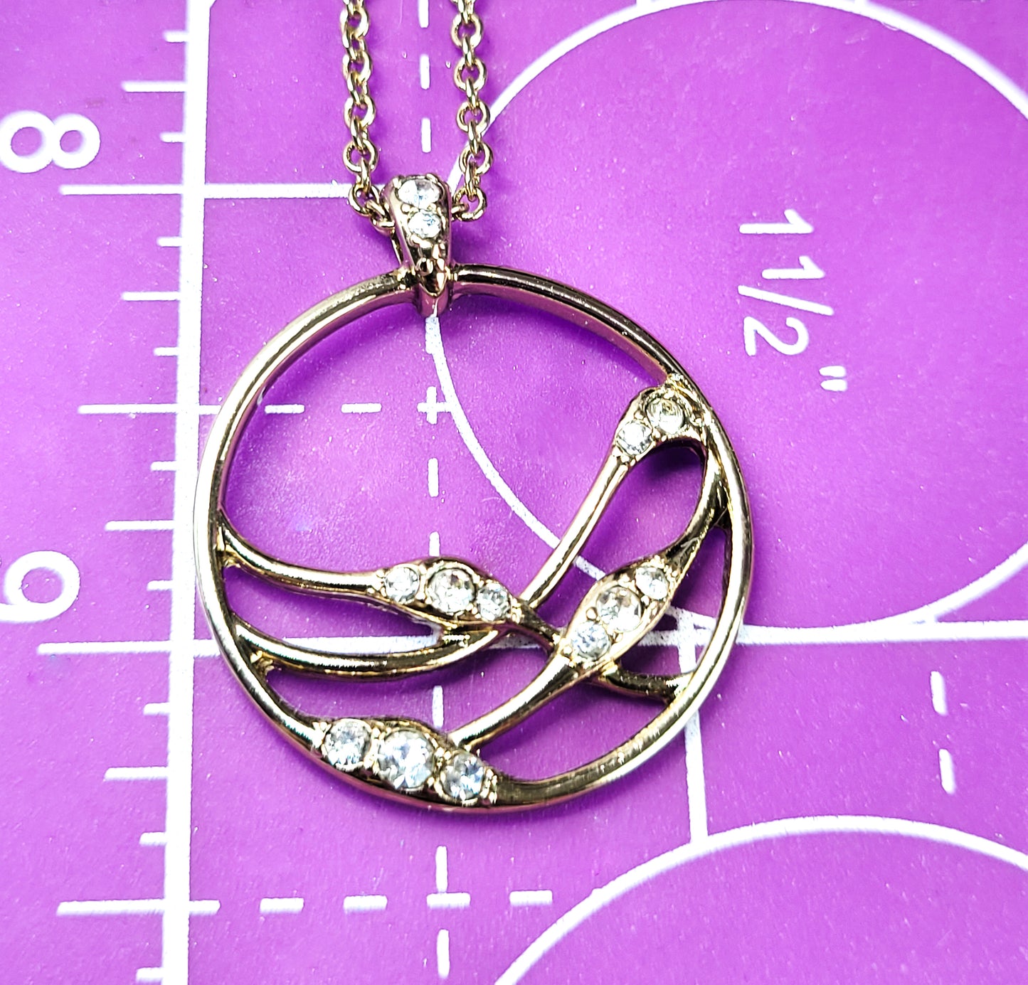 Avon NRT signed vintage gold plated circle rhinestone pendant necklace
