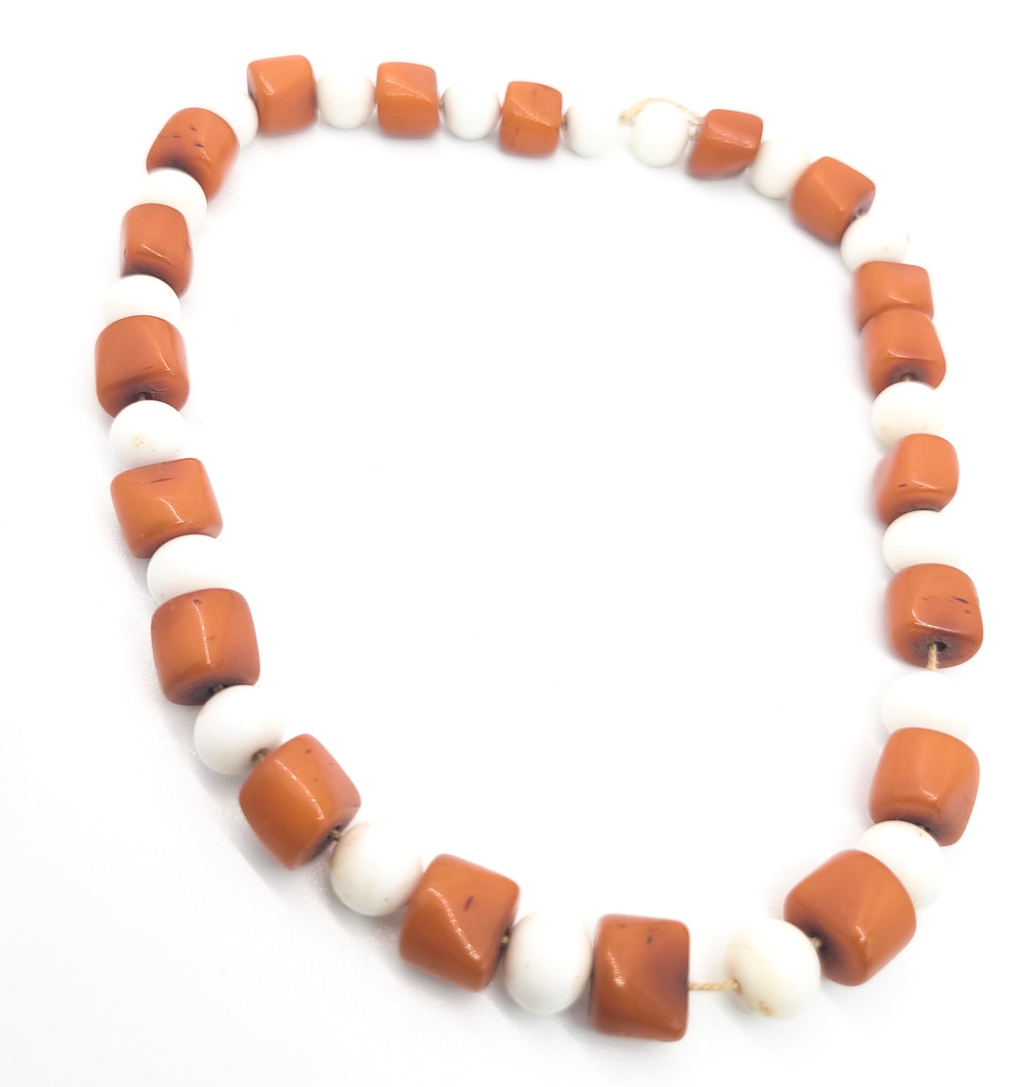 Amber bakelite and white milk glass strand of vintage beads on silk