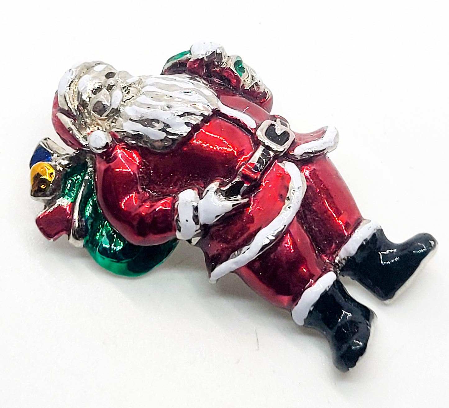 Santa with presents Christmas silver tone painted vintage holiday brooch
