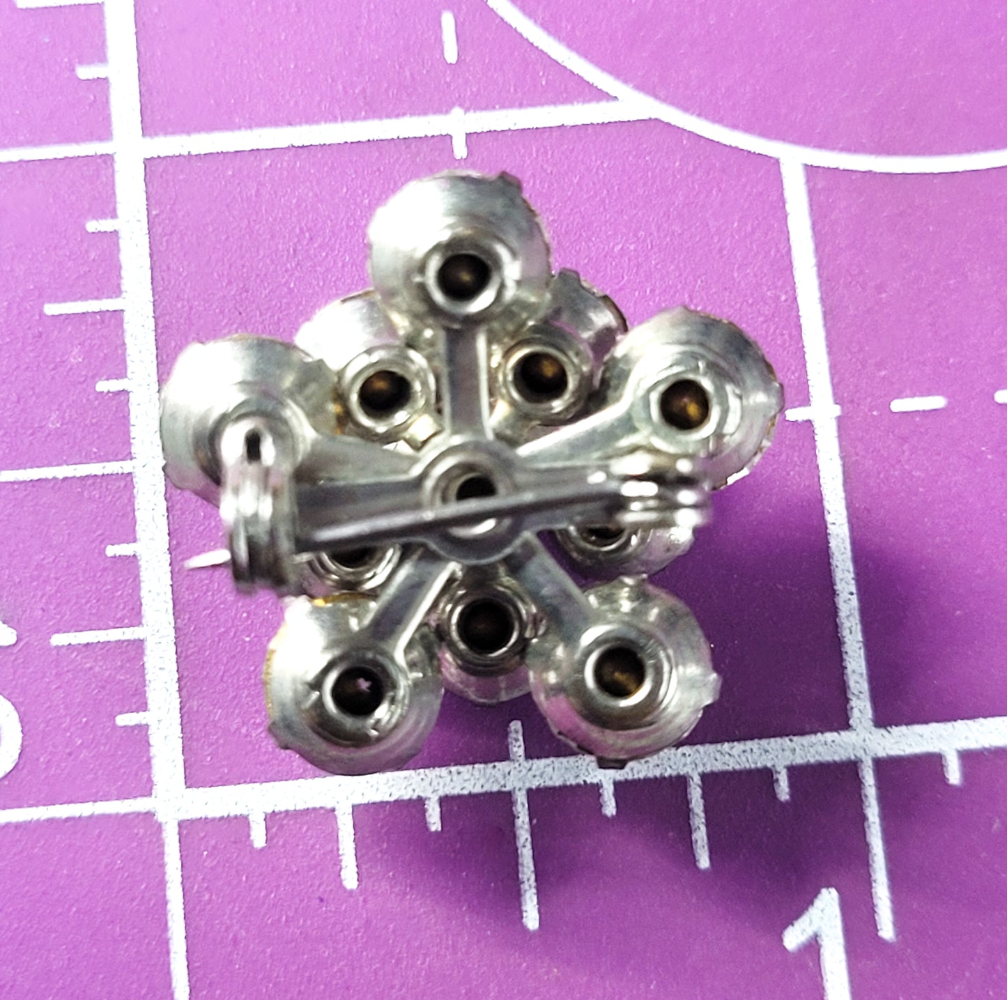 Bright clear rhinestone dimentional mid century flower vintage brooch