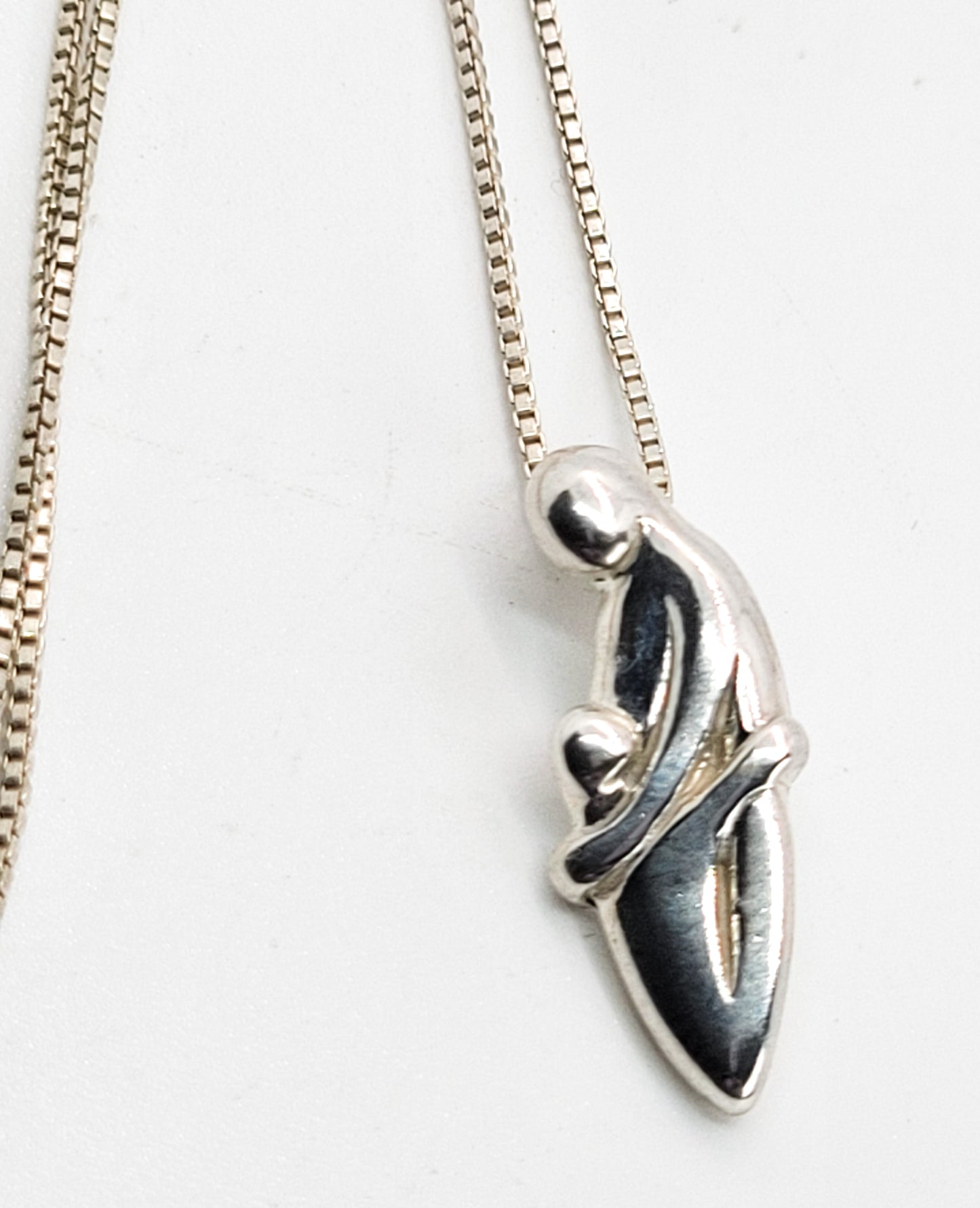 Mother and Child hugging magnetic clasp sterling silver pendant necklace