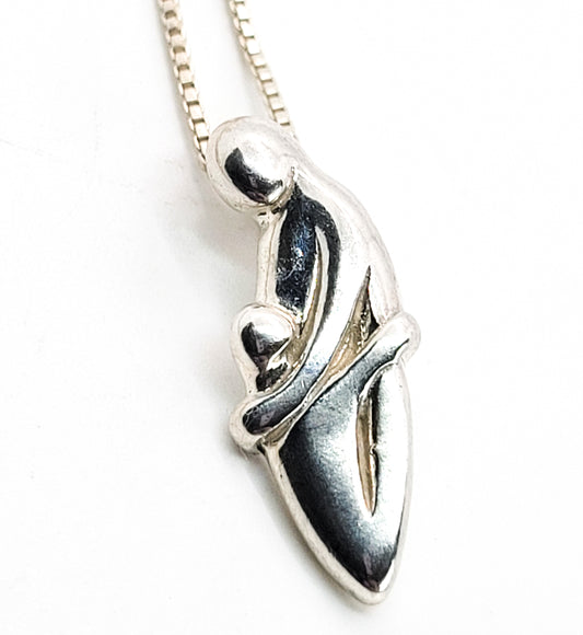 Mother and Child hugging magnetic clasp sterling silver pendant necklace