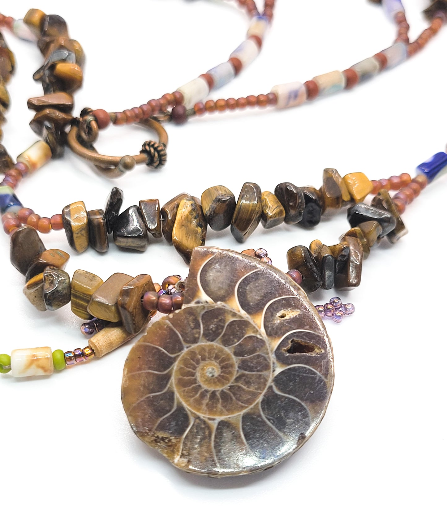 Artisan Tiger's eye scalloped heishe beaded Ammonite shell fetish style necklace