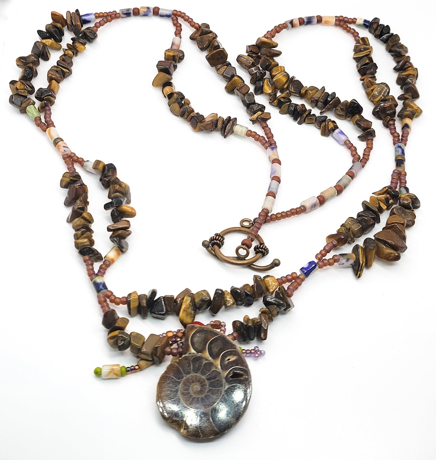 Artisan Tiger's eye scalloped heishe beaded Ammonite shell fetish style necklace