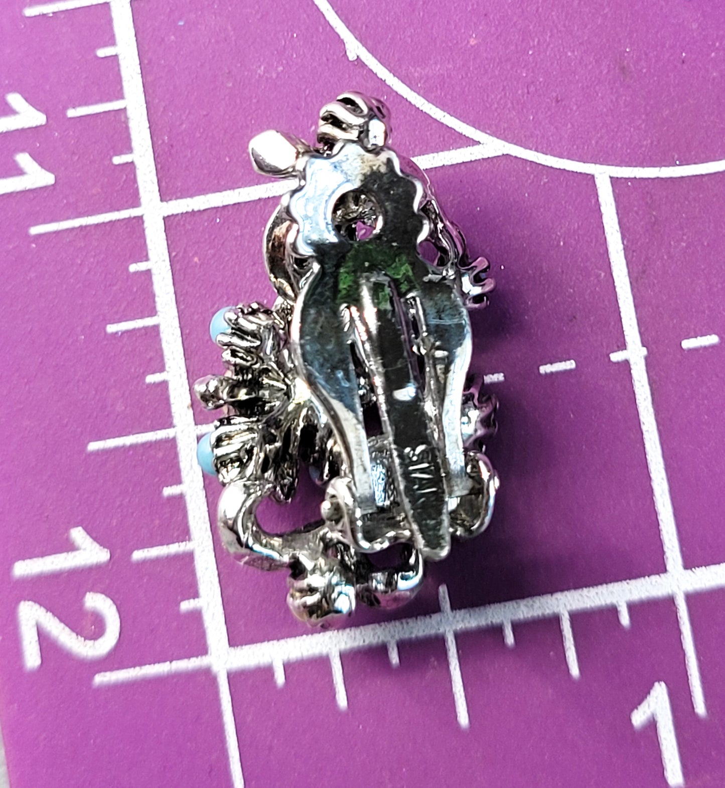 Star signed baby blue silver toned vintage flower earrings with faux pearl accents.