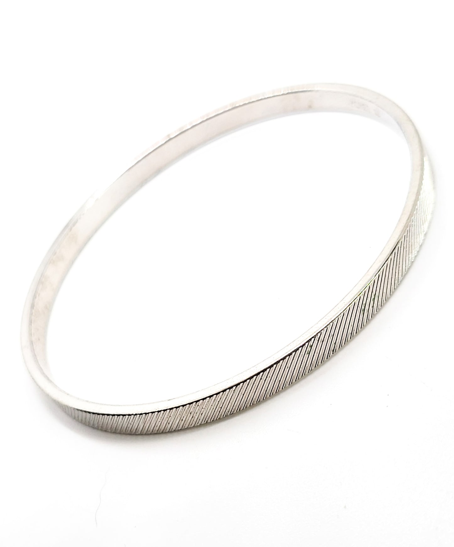 Monet silver toned etched line thin textured vintage bangle bracelet