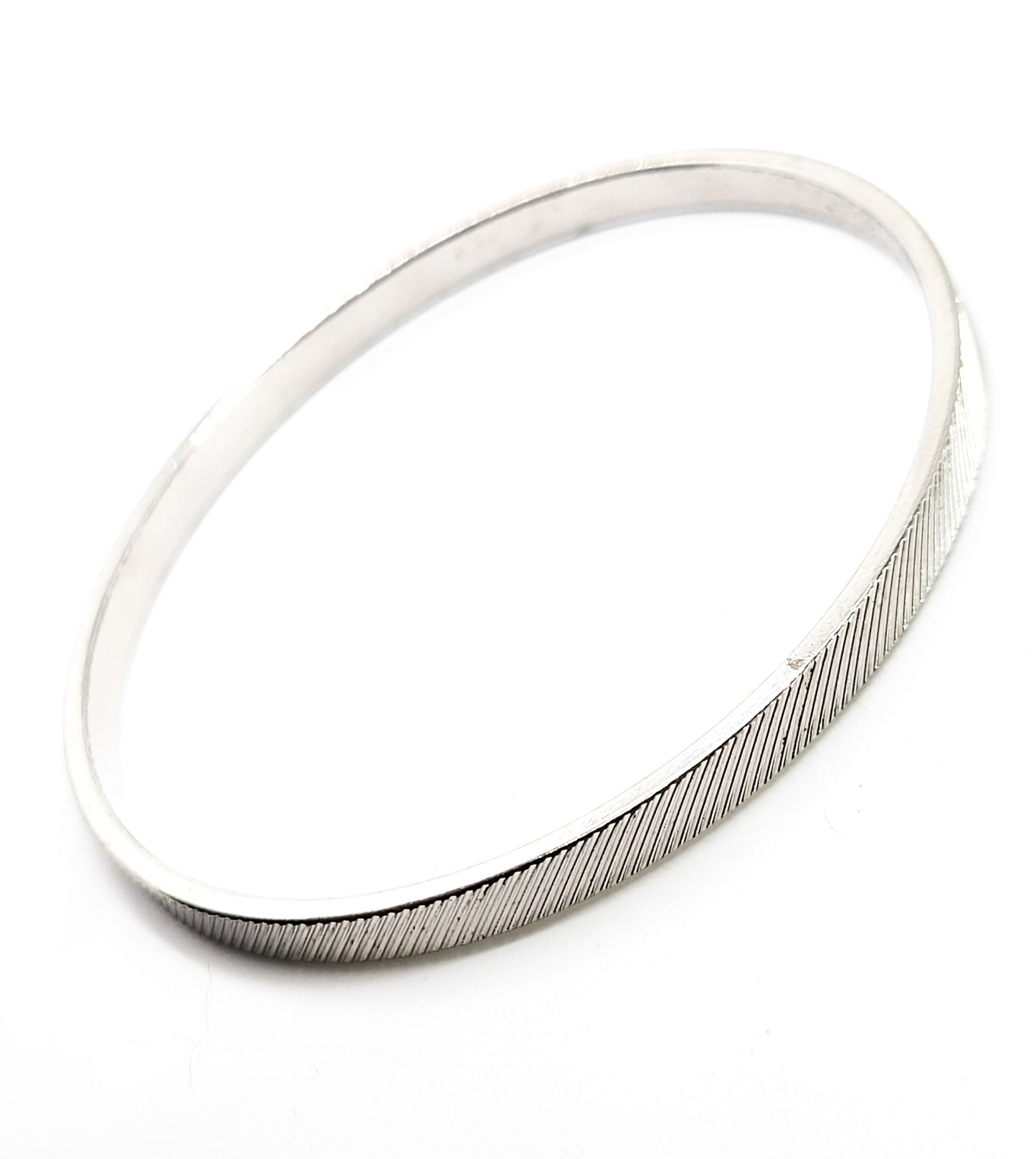 Monet silver toned etched line thin textured vintage bangle bracelet