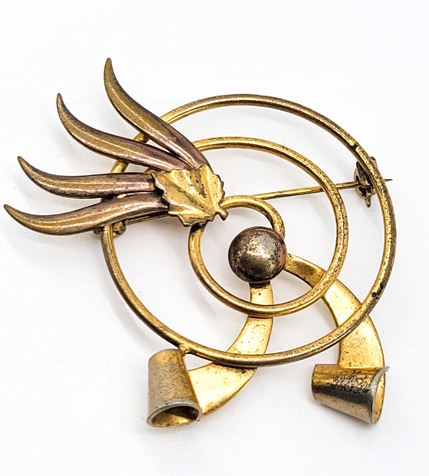 Modernist gold toned atomic spiral 2 tone vintage brooch