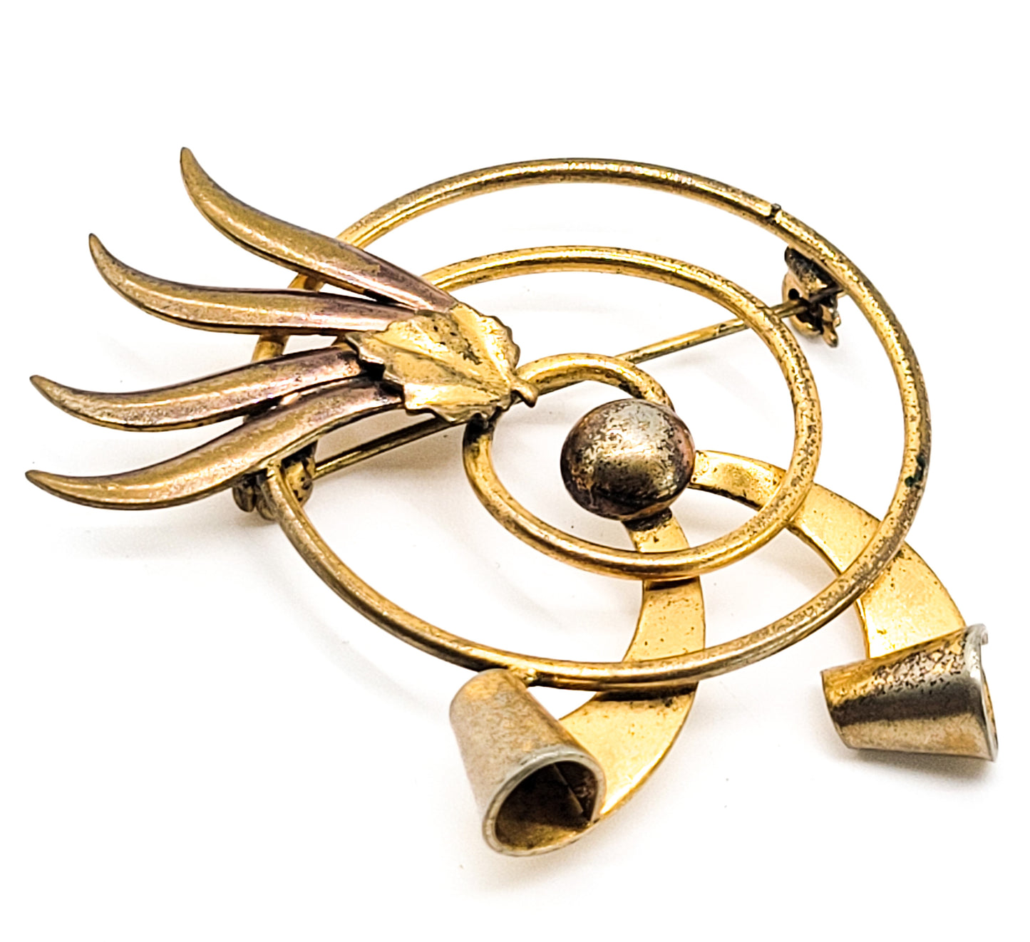 Modernist gold toned atomic spiral 2 tone vintage brooch