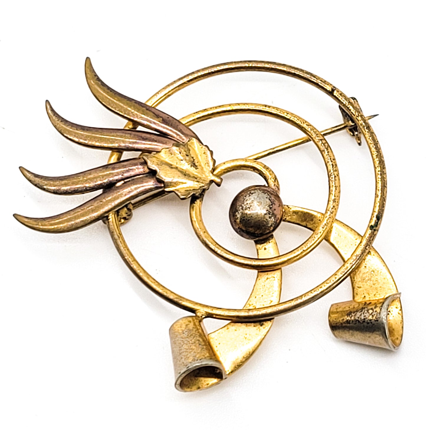 Modernist gold toned atomic spiral 2 tone vintage brooch