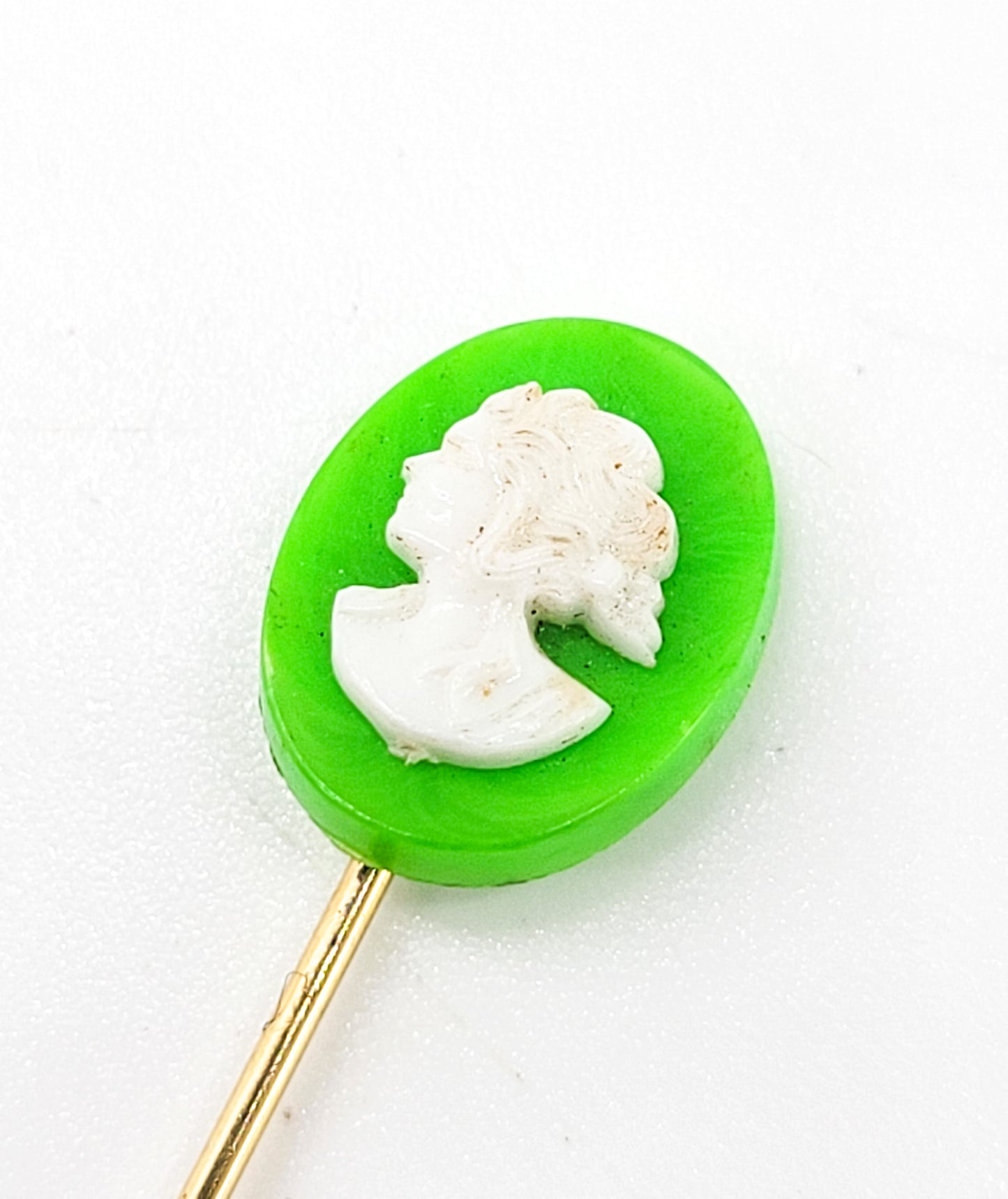 Green plastic cameo vintage stick lapel pin brooch