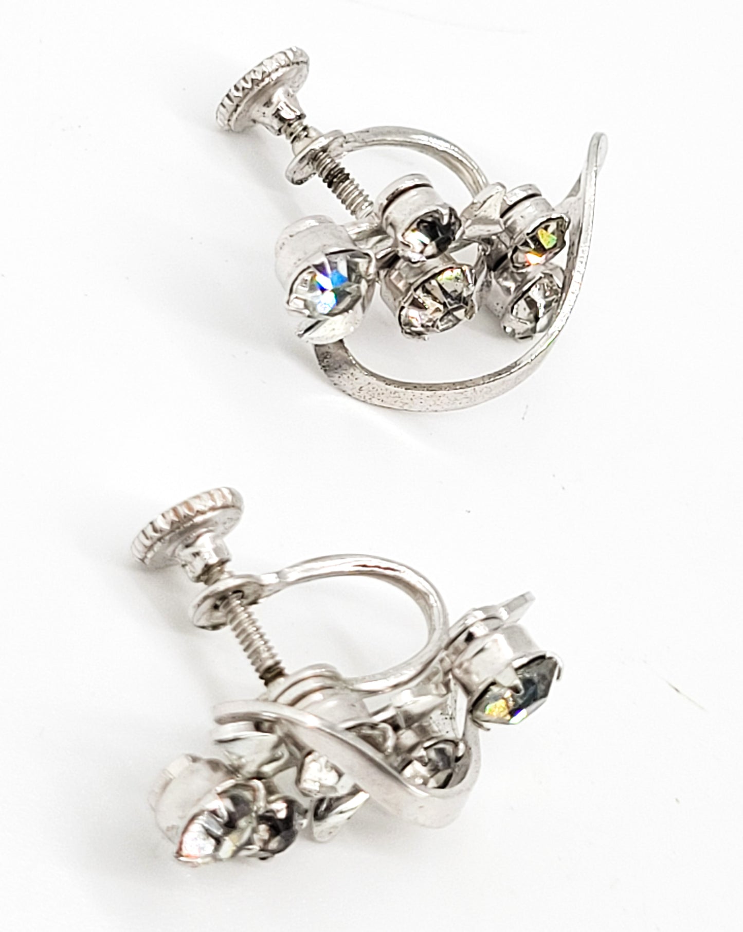 Clear rhinestone atomic swirl vintage clear mid century silver screw back earrings