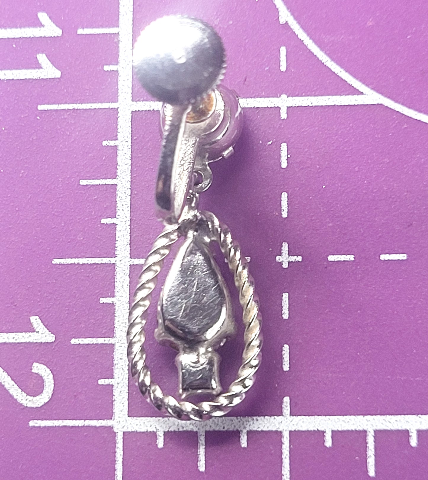 Twisted rope clear rhinestone silver toned screw back earrings