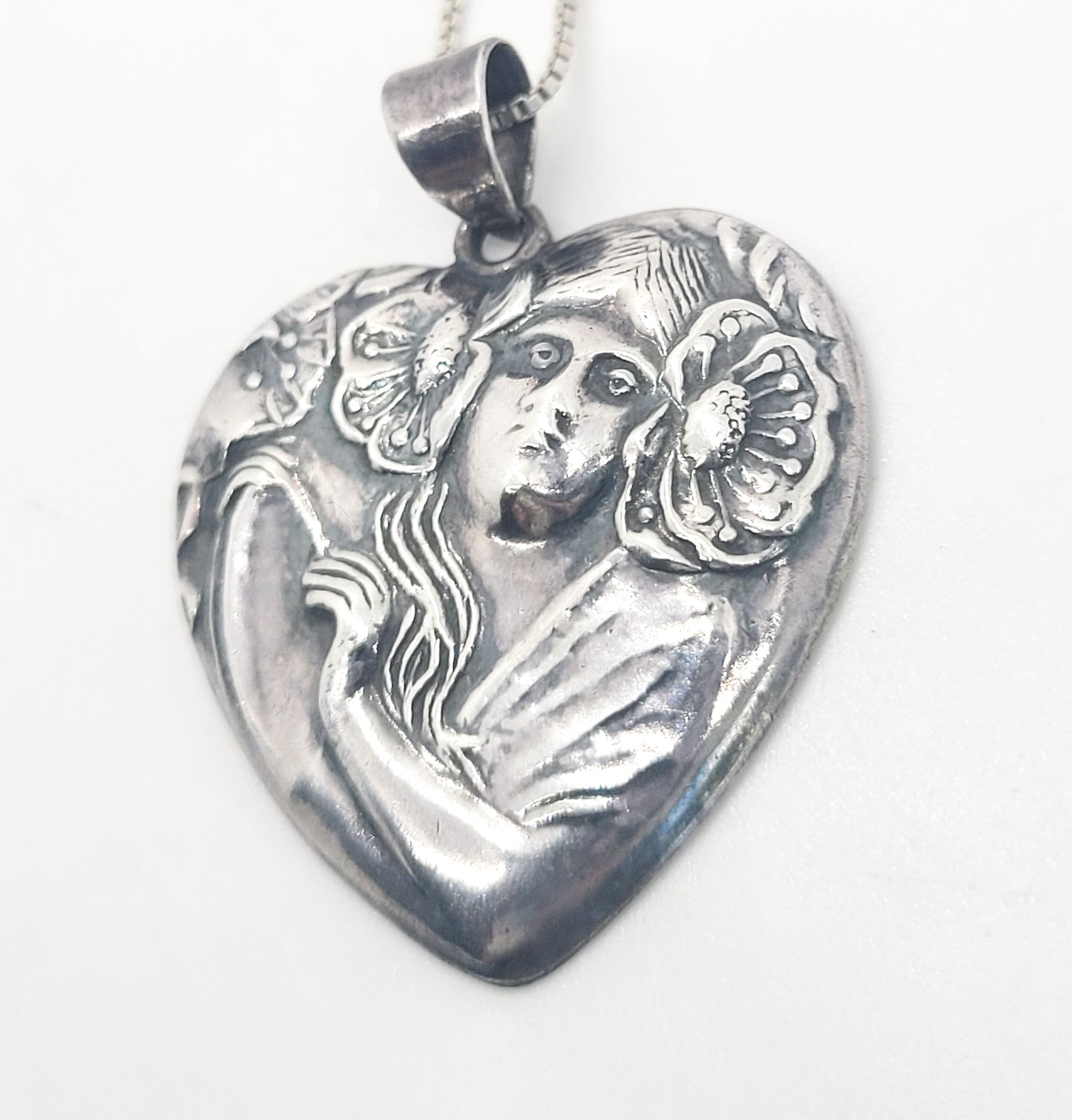 Art Nouveau style Nymph in flowers vintage sterling silver heart pendant