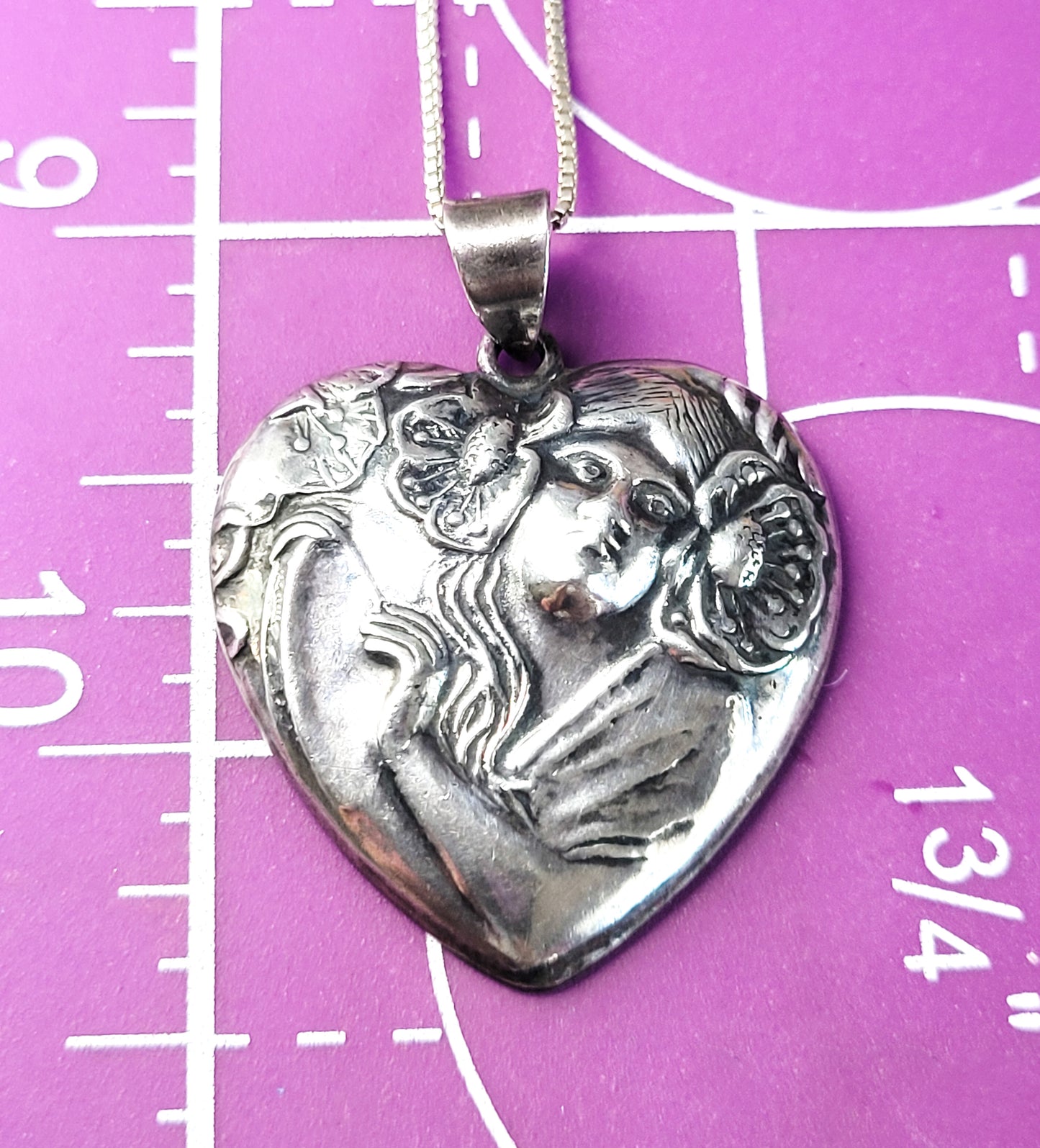 Art Nouveau style Nymph in flowers vintage sterling silver heart pendant