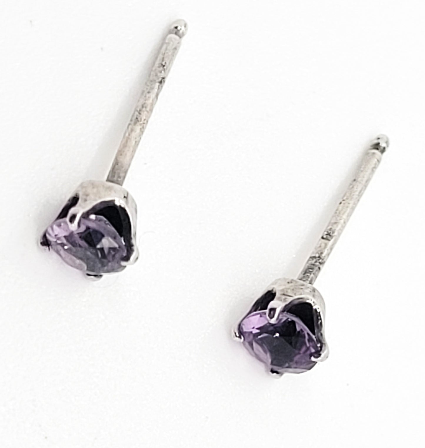 STG Sterling silver purple claw set Cubic Zirconia CZ earrings