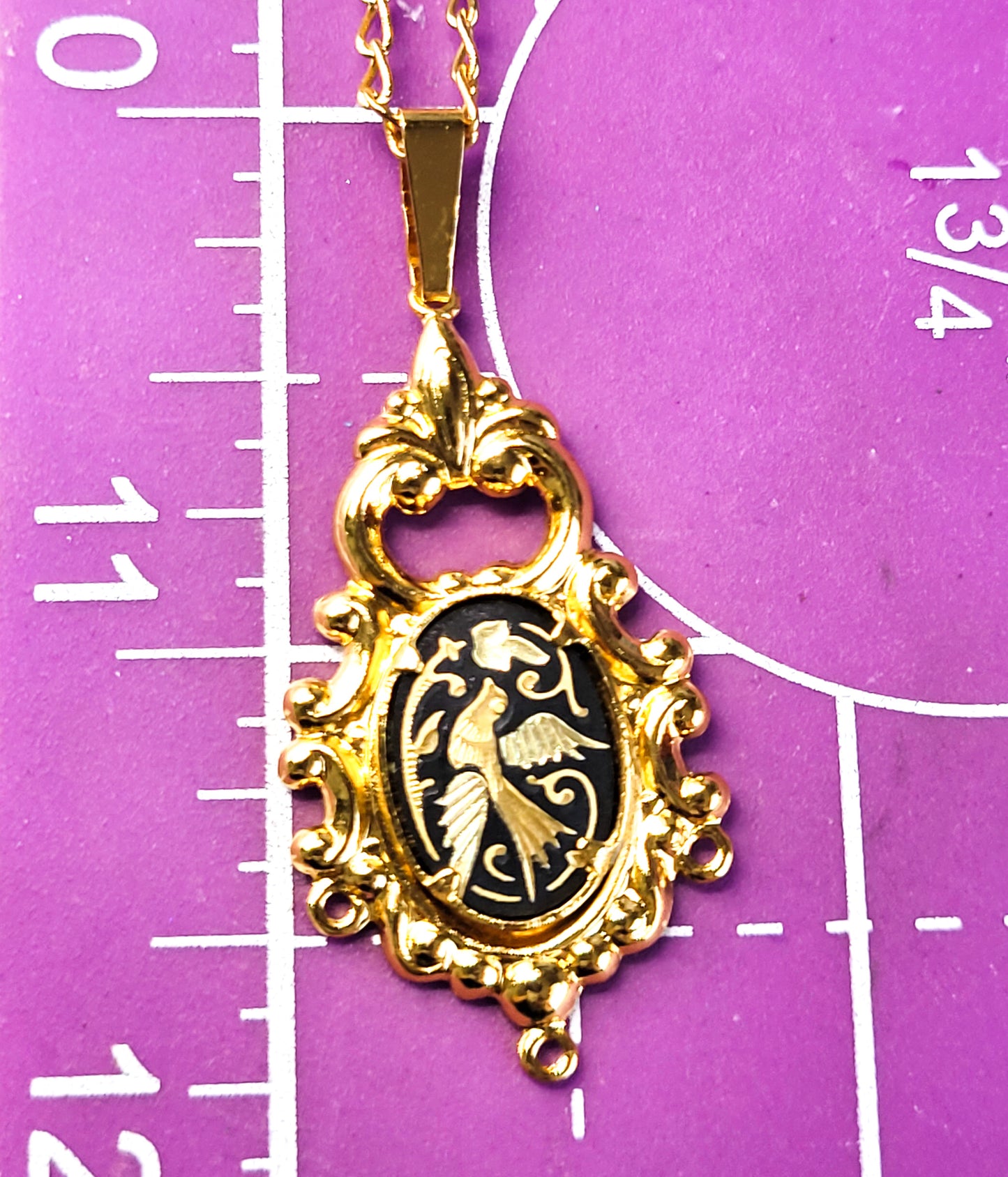 Spanish Damascene Flying swallow Black and Gold toned bird necklace