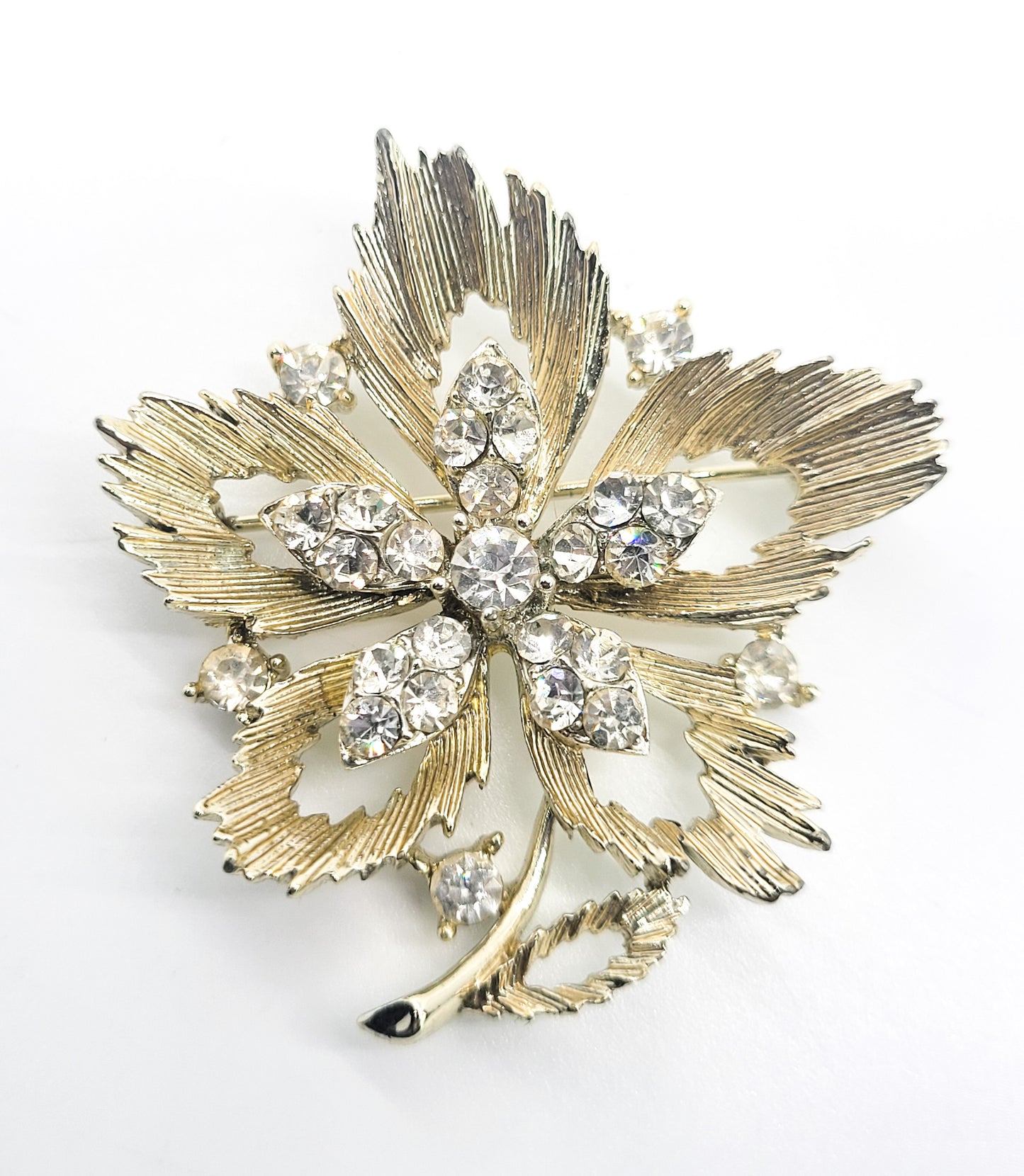 Lisner Maple leaf gold toned clear rhinestone vintage mid century brooch