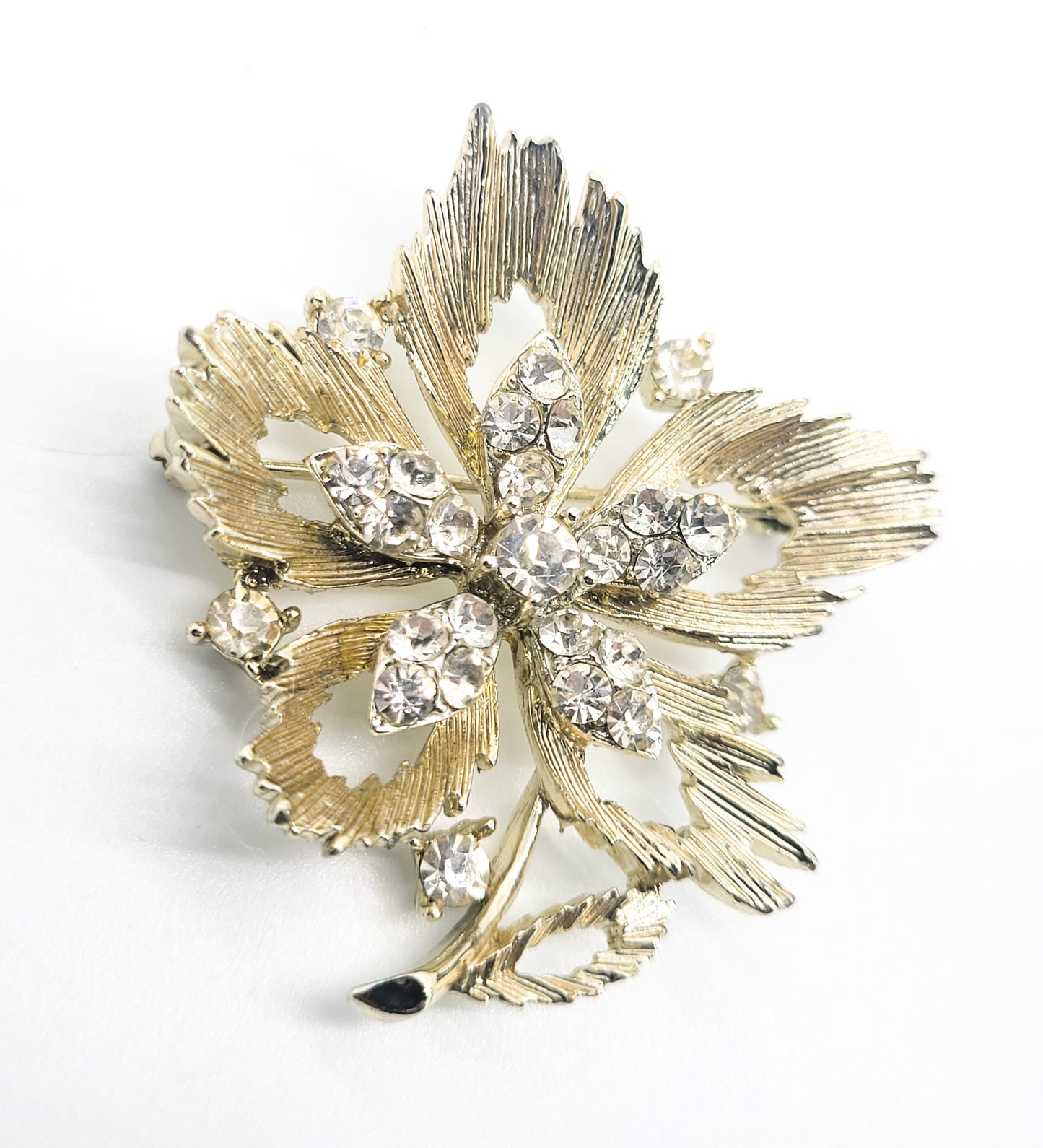 Lisner Maple leaf gold toned clear rhinestone vintage mid century brooch