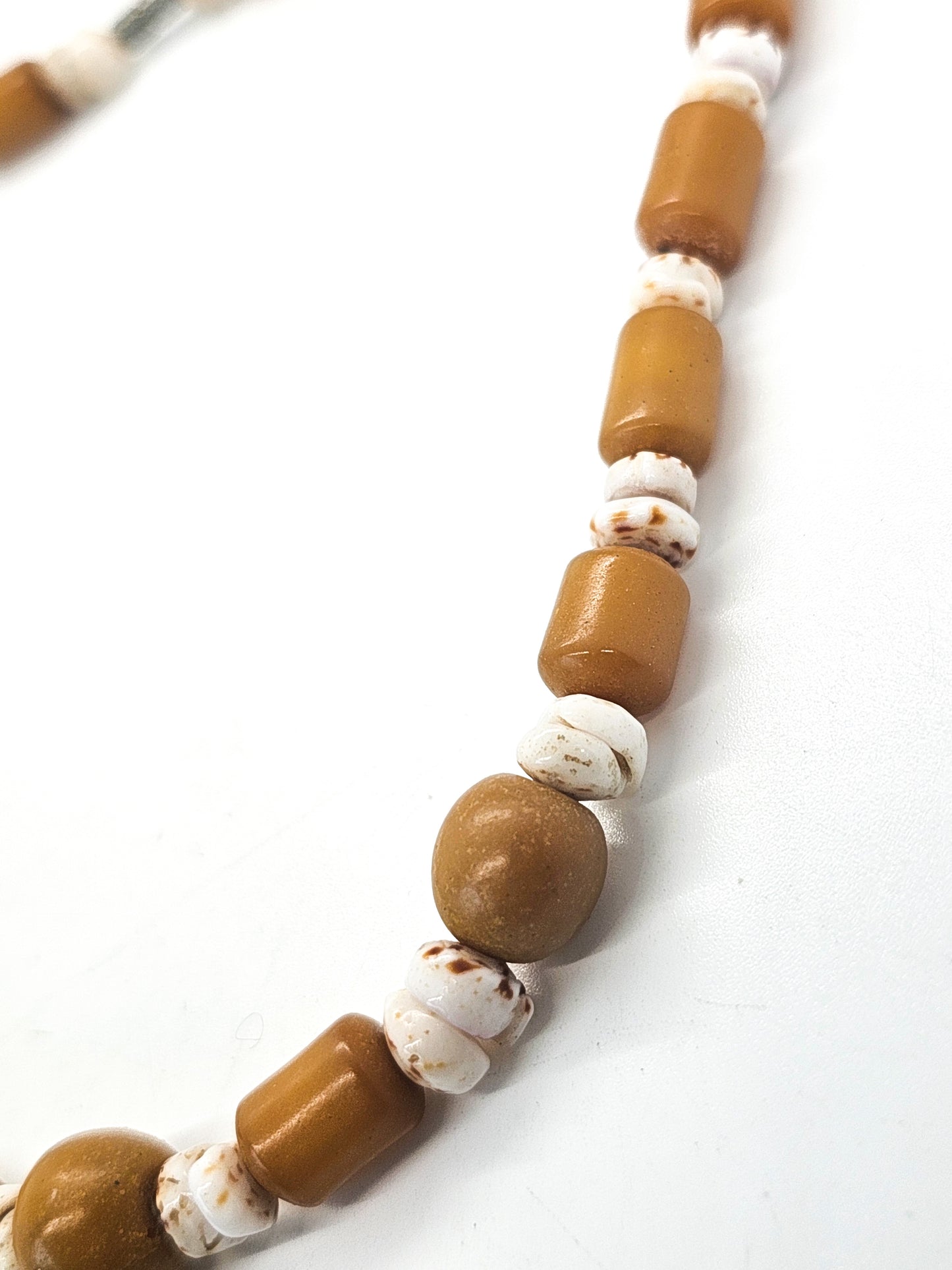 Puka shell and compressed amber vintage beaded necklace