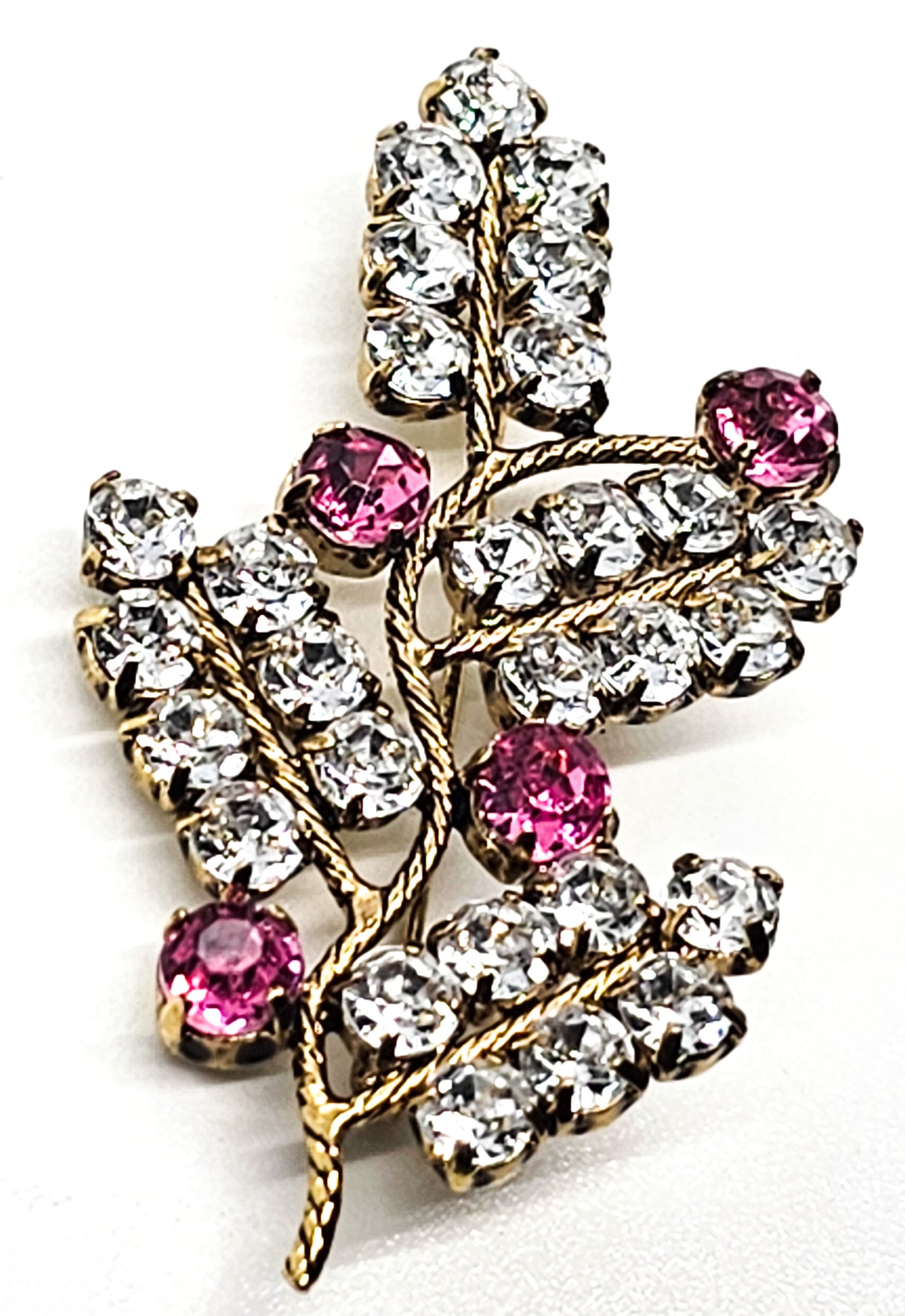 Pink and white gold toned vintage sparkling rhinestone spray brooch