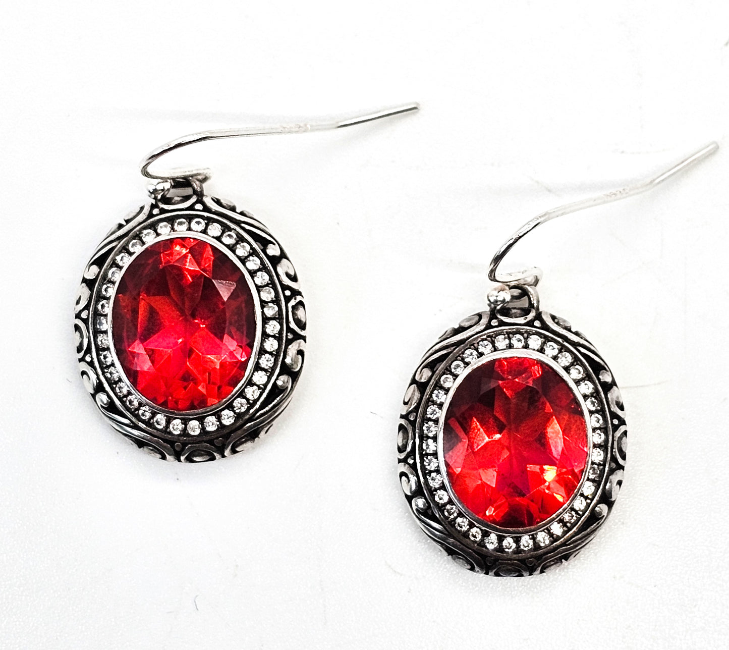 Balinese red faceted gemstone with Cubic Zirconia halo sterling silver earrings