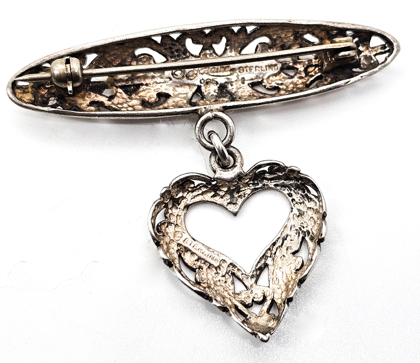 Jezlaine open work filigree heart drop medal style vintage sterling silver brooch