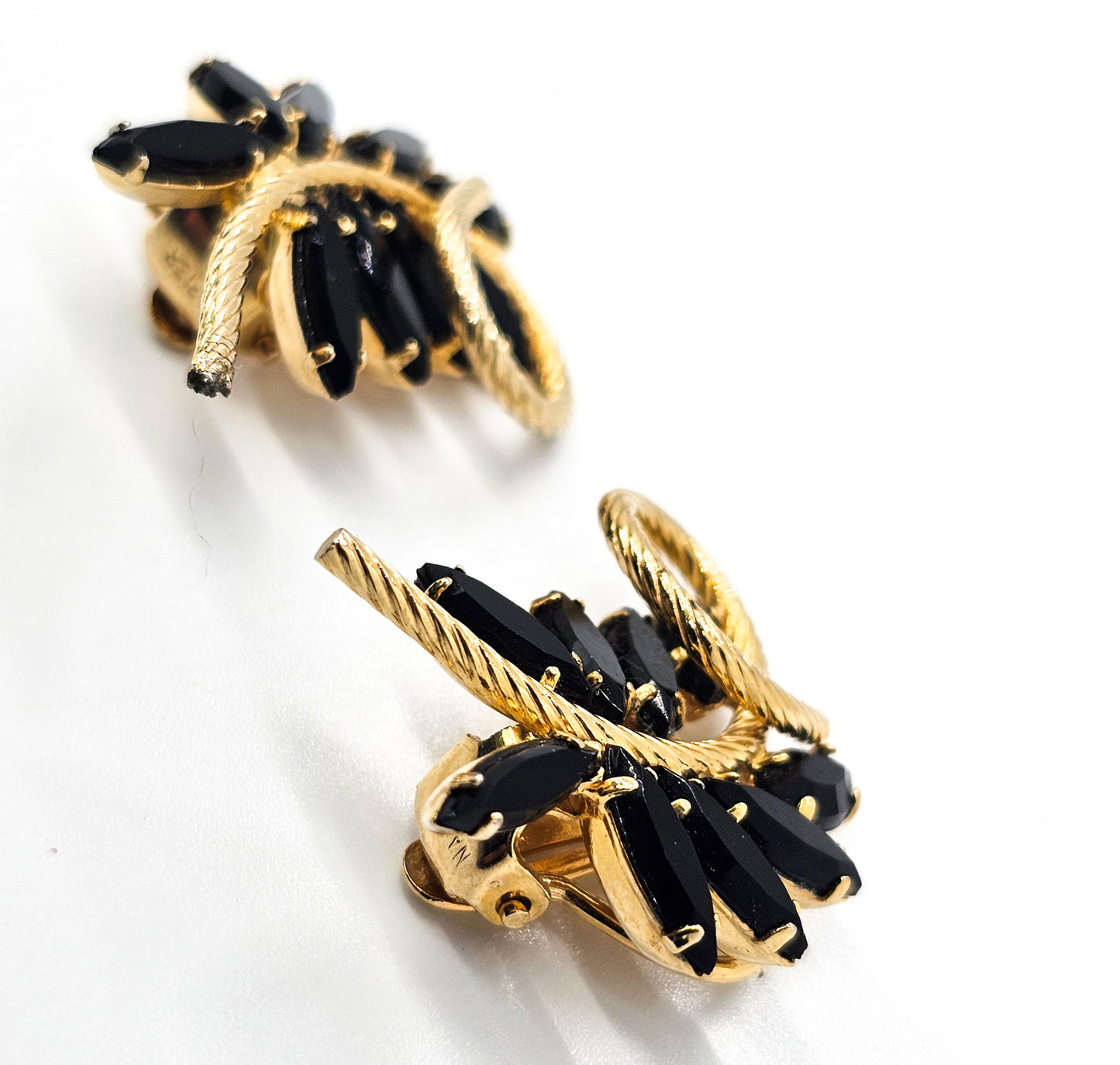 Napier black rhinestone leaf gold toned vintage signed clip on earrings