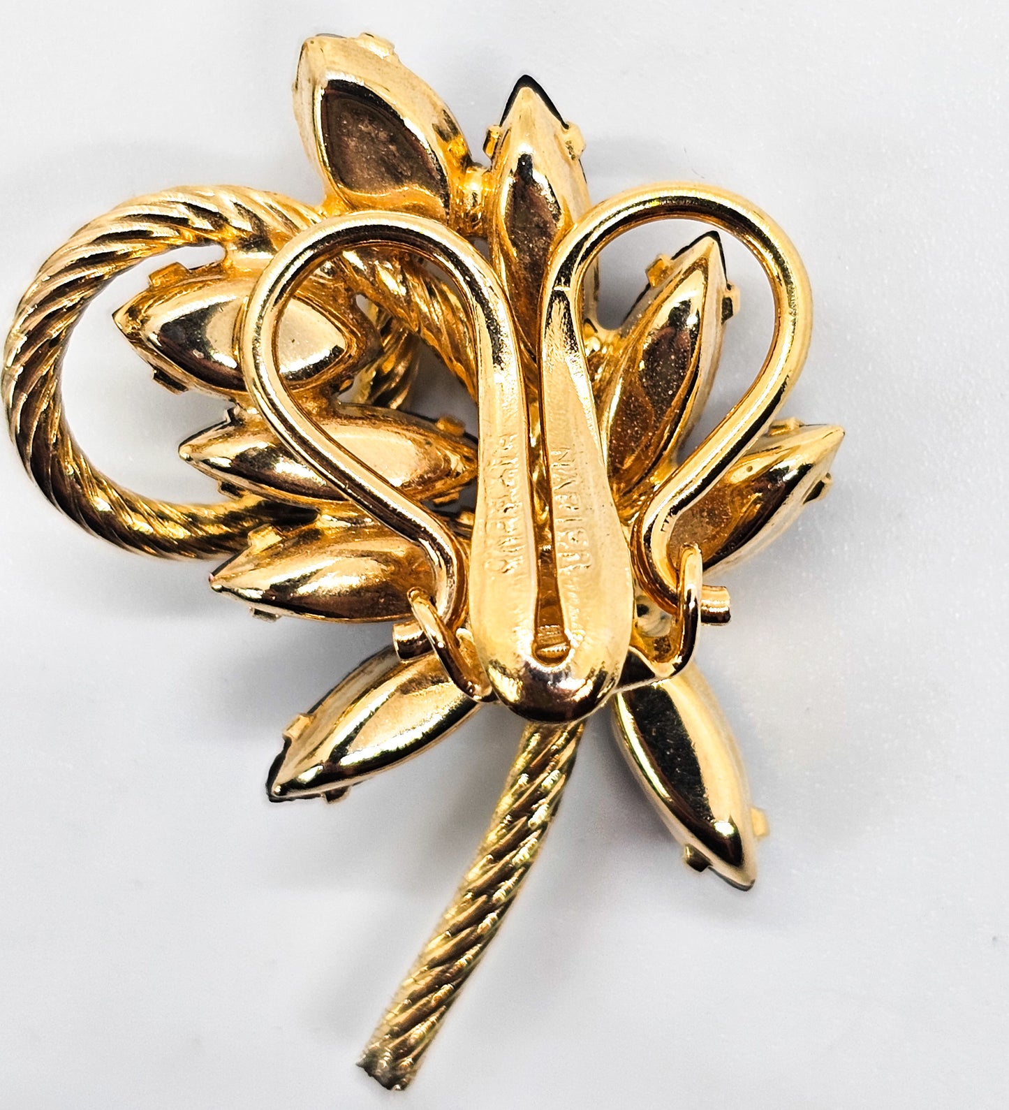 Napier black rhinestone leaf gold toned vintage signed clip on earrings