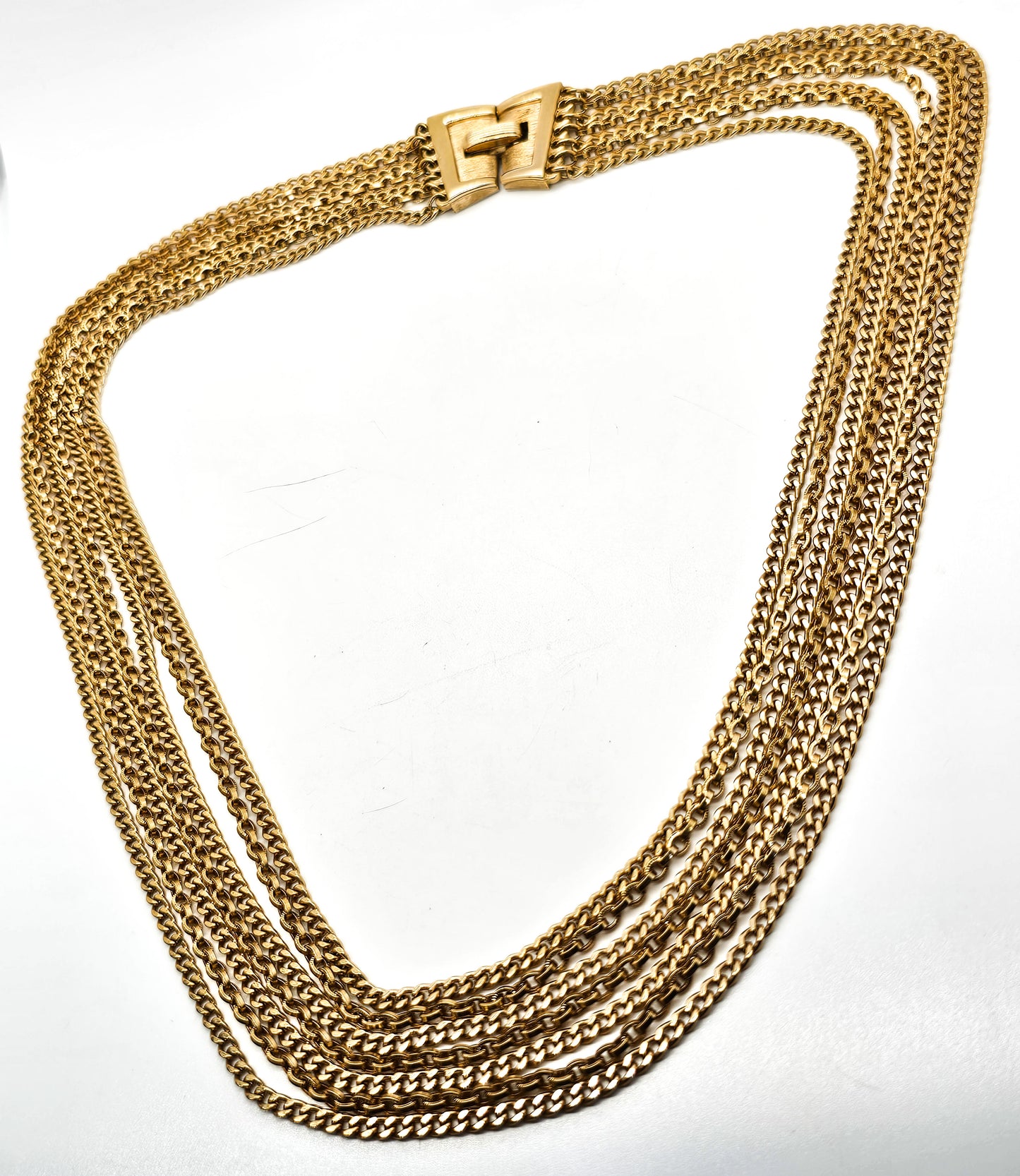 Crown Trifari gold toned 7 layer vintage chain necklace with fold over clasp